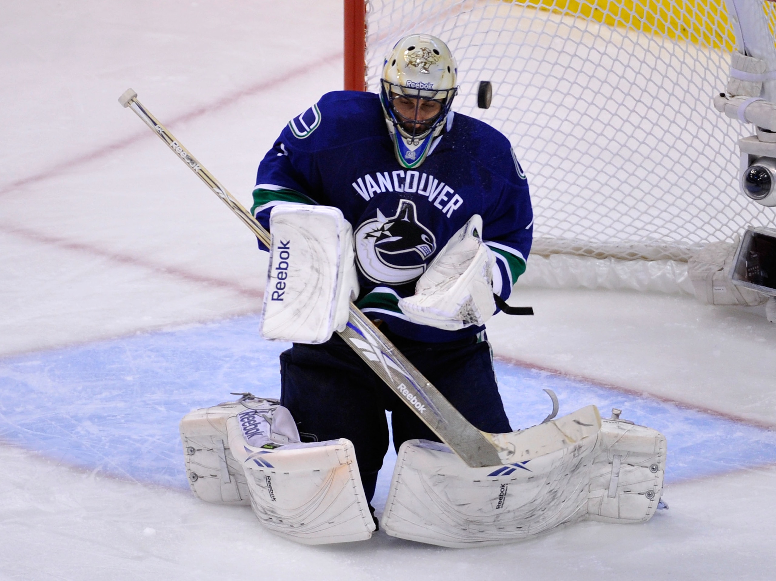 VANCOUVER, CANADA - MAY 24:  Goaltender Roberto Luongo #1 of the Vancouver Canucks makes a save in Game Five of the Western Conference Finals against the San Jose Sharks during the 2011 Stanley Cup Playoffs at Rogers Arena on May 24, 2011 in Vancouver, Br