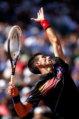 PARIS, FRANCE - MAY 25:  Novak Djokovic of Serbia serves during the men's singles round two match between Victor Hanescu of Romania and Novak Djokovic of Serbia on day four of the French Open at Roland Garros on May 25, 2011 in Paris, France.  (Photo by M