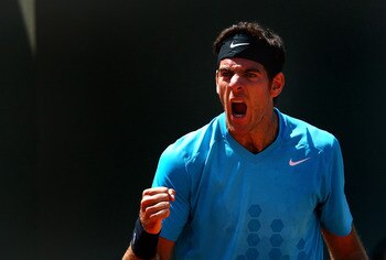 PARIS, FRANCE - MAY 23:  Juan Martin Del Potro of Argentina celebrates a point during the men's singles first round match between Juan Martin Del Potro of Argentina and Ivo Karlovic of Croatia on day two of the French Open at Roland Garros on May 23, 2011