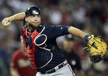 PHOENIX, AZ - MAY 18:  Catcher Brian McCann #16 of the Atlanta Braves in action during the Major League Baseball game against the Arizona Diamondbacks at Chase Field on May 18, 2011 in Phoenix, Arizona.  The Diamondbacks defeated the Braves 5-4 in eleven