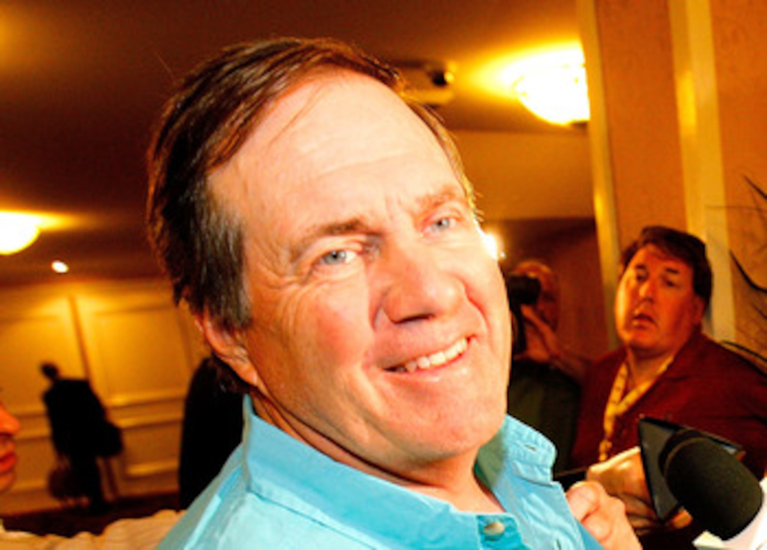 NEW ORLEANS, LA - MARCH 21: New England Patriot head coach Bill Belichick jokes with the media after missing breakfast during the NFL Annual Meetings at the Roosevelt Hotel on March 21, 2011 in New Orleans, Louisiana. Despite a NFL owners imposed lockout
