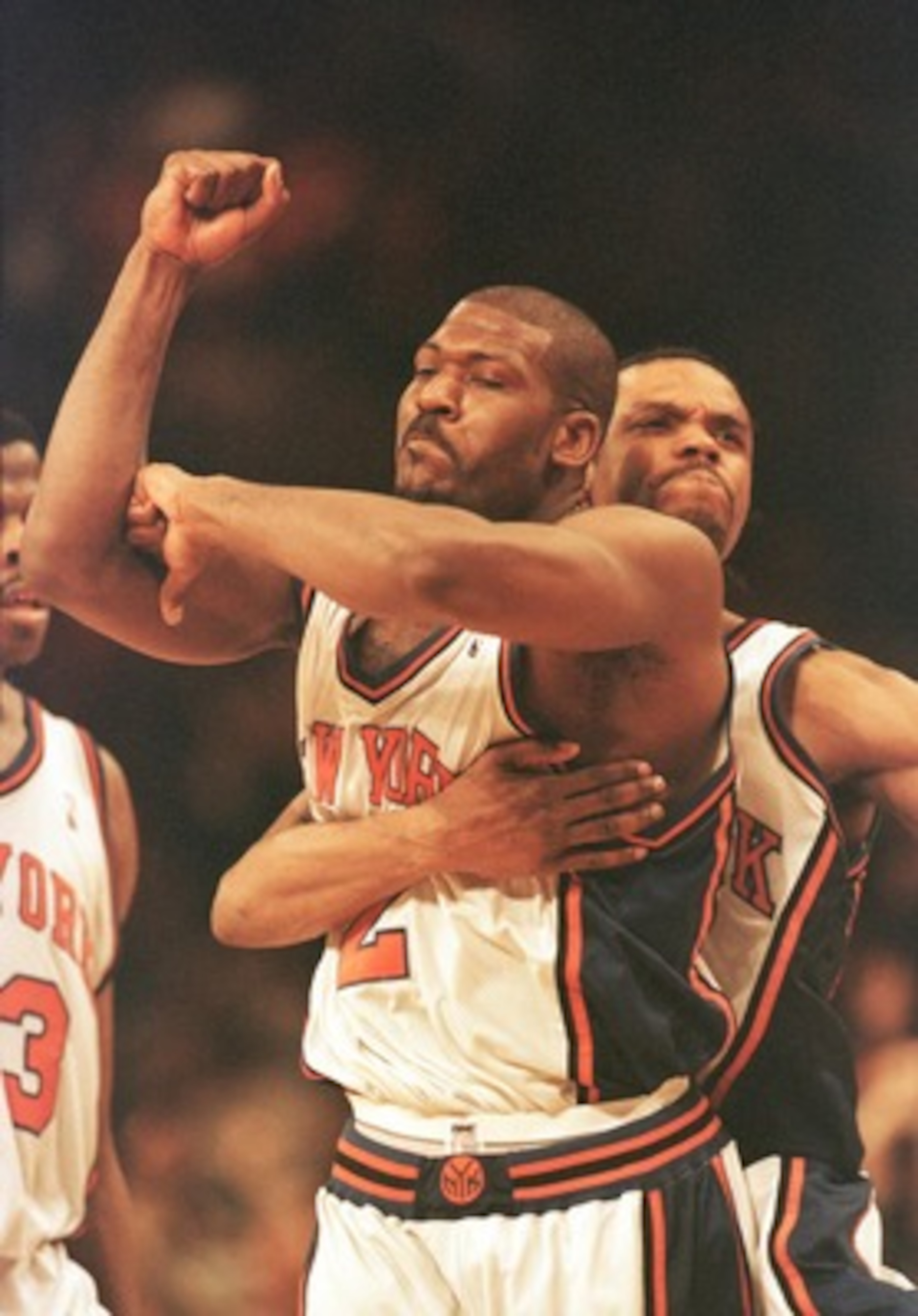 23 Apr 2000: Larry Johnson #2 of the New York Knicks is hugged from behind by teammate Latrell Sprewell after Johnson hit a three-point basket to give the Knicks a 88-85 win over the Toronto Raptors at Madison Square Garden in New York City. The Knicks le 23 Apr 2000: Larry Johnson #2 of the New York Knicks is hugged from behind by teammate Latrell Sprewell after Johnson hit a three-point basket to give the Knicks a 88-85 win over the Toronto Raptors at Madison Square Garden in New York City. The Knicks le