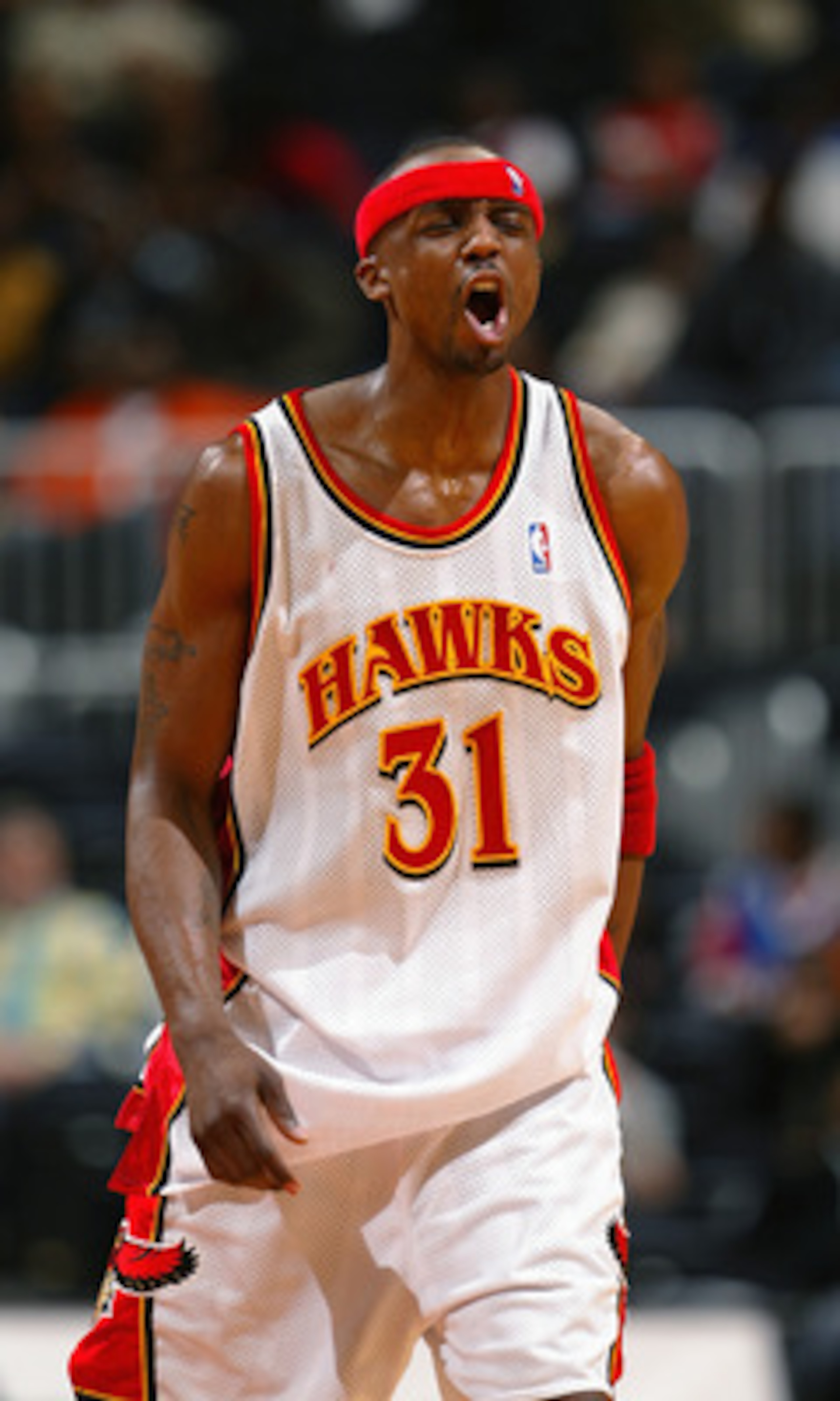 ATLANTA - MARCH 31:  Jason Terry #31 of the Miami Heat reacts after the play against the Atlanta Hawks during the game at Philips Arena on March 31, 2004 in Atlanta, Georgia.  The Heat won 100-97.  NOTE TO USER: User expressly acknowledges and agrees that