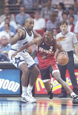 2 Feb 1996:  Orlando Magic forward Dennis Scott guards Atlanta Hawks forward Stacey Augmon during game at the Orlando Arena in Orlando, Florida.  The Magic won the game 108-95. Mandatory Credit: Allsport  /Allsport