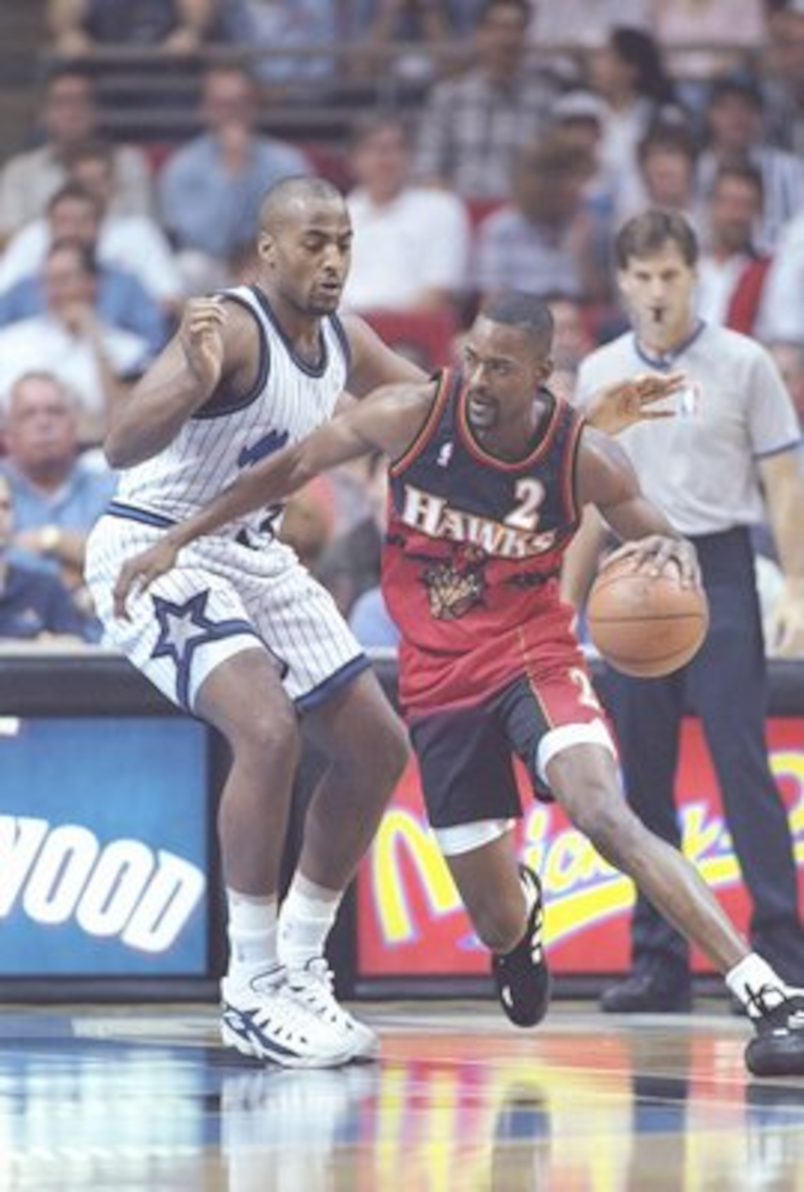 2 Feb 1996:  Orlando Magic forward Dennis Scott guards Atlanta Hawks forward Stacey Augmon during game at the Orlando Arena in Orlando, Florida.  The Magic won the game 108-95. Mandatory Credit: Allsport  /Allsport