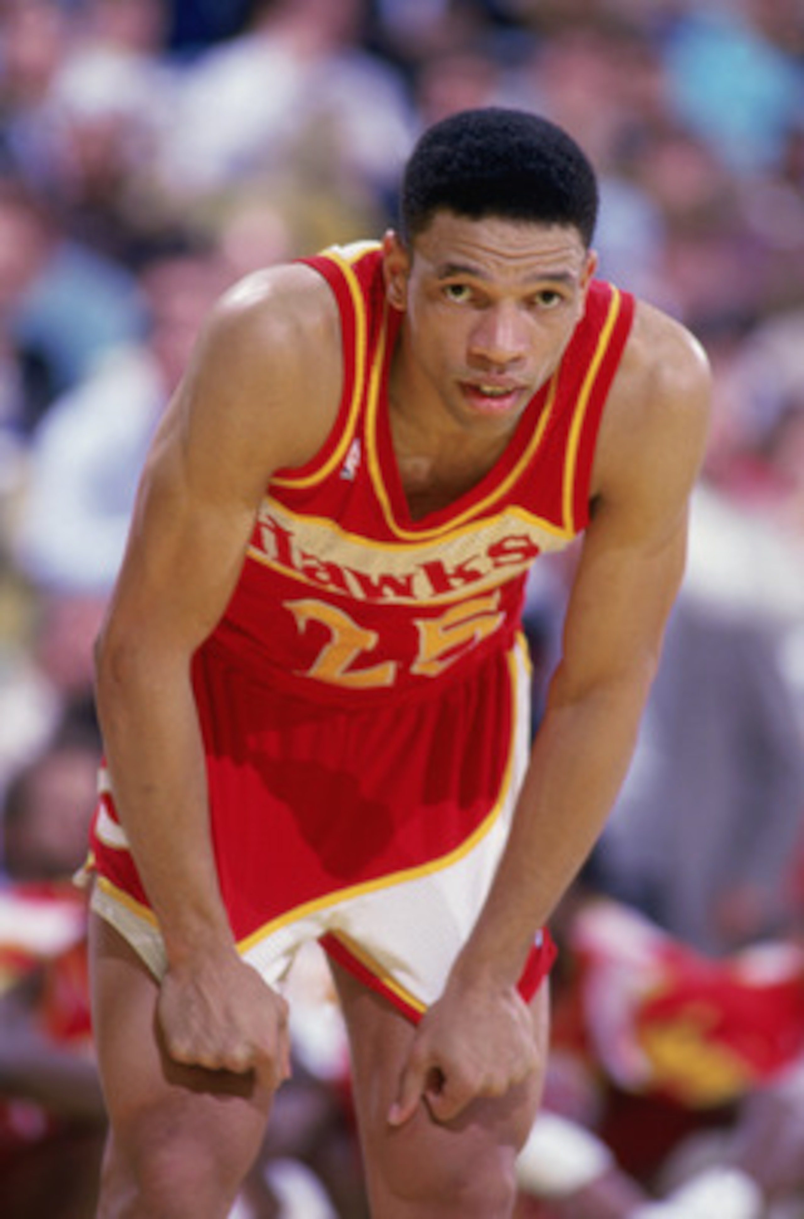 LOS ANGELES - JANUARY 1:  Glenn Rivers #25 of the Atlanta Hawks rests, during the NBA game against the Los Angeles Lakers at the Great Western Forum in Los Angeles, California on January 1, 1988.  NOTE TO USER: User expressly acknowledges and agrees that,