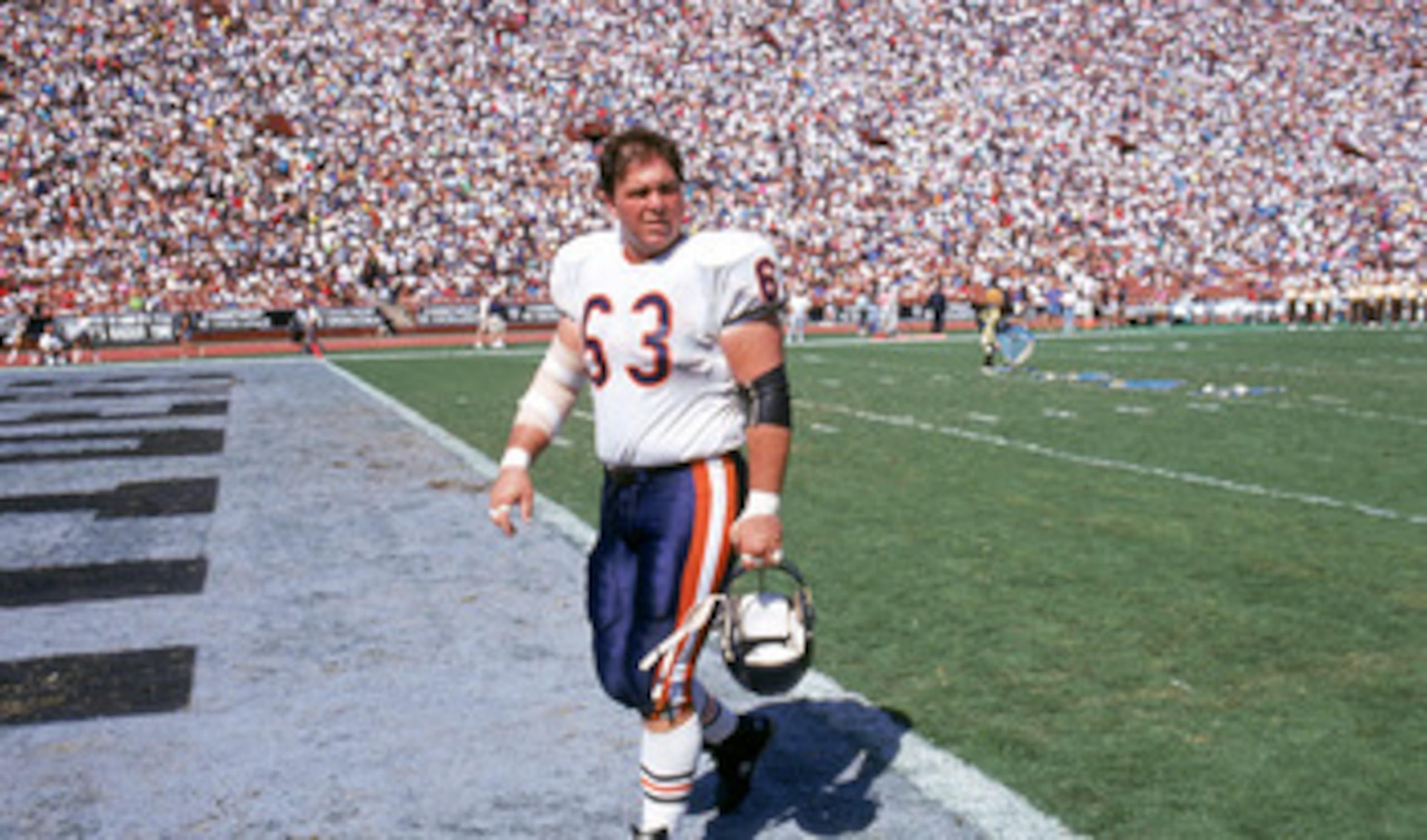 LOS ANGELES - SEPTEMBER 30:  Center Jay Hilgenberg #63 of the Chicago Bears walks off the field during a game against the Los Angeles Raiders at the Los Angeles Memorial Coliseum on September 30, 1990 in Los Angeles, California.  The Raiders won 24-10.  (