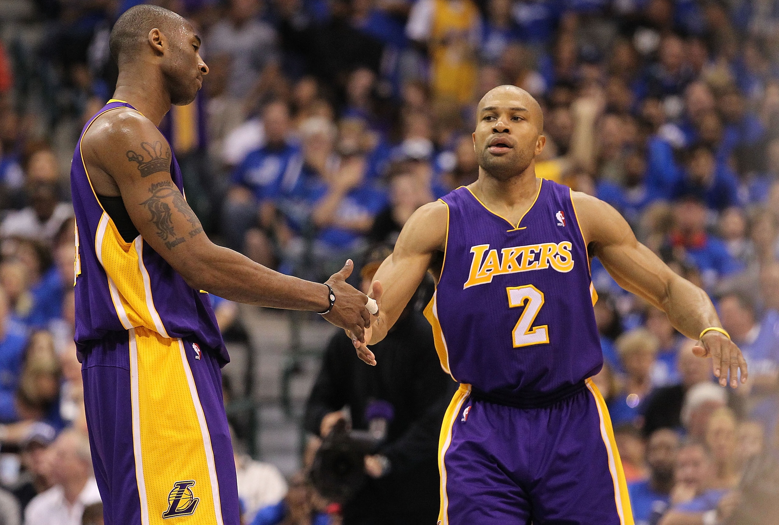 DALLAS, TX - MAY 06: Guard Kobe Bryant #24 and Derek Fisher #2 of the Los Angeles Lakers react against the Dallas Mavericks in Game Three of the Western Conference Semifinals during the 2011 NBA Playoffs on May 6, 2011 at American Airlines Center in Dall DALLAS, TX - MAY 06: Guard Kobe Bryant #24 and Derek Fisher #2 of the Los Angeles Lakers react against the Dallas Mavericks in Game Three of the Western Conference Semifinals during the 2011 NBA Playoffs on May 6, 2011 at American Airlines Center in Dall