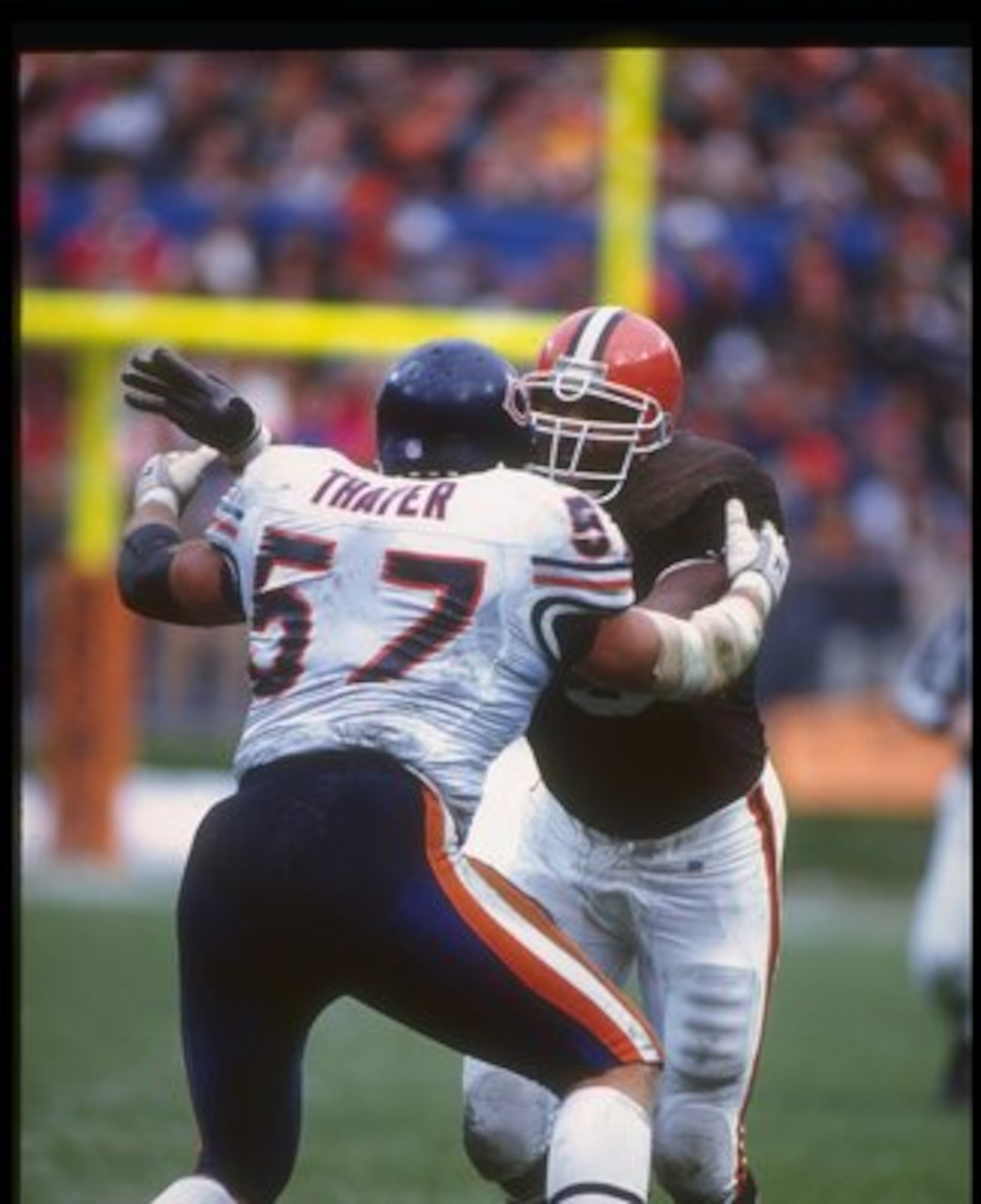 29 Nov 1992: Defensive lineman Rob Burnett of the Cleveland Browns works against Chicago Bears offensive lineman Tom Thayer during a game at Soldier Field in Chicago, Illinois. The Browns won the game, 27-14.
