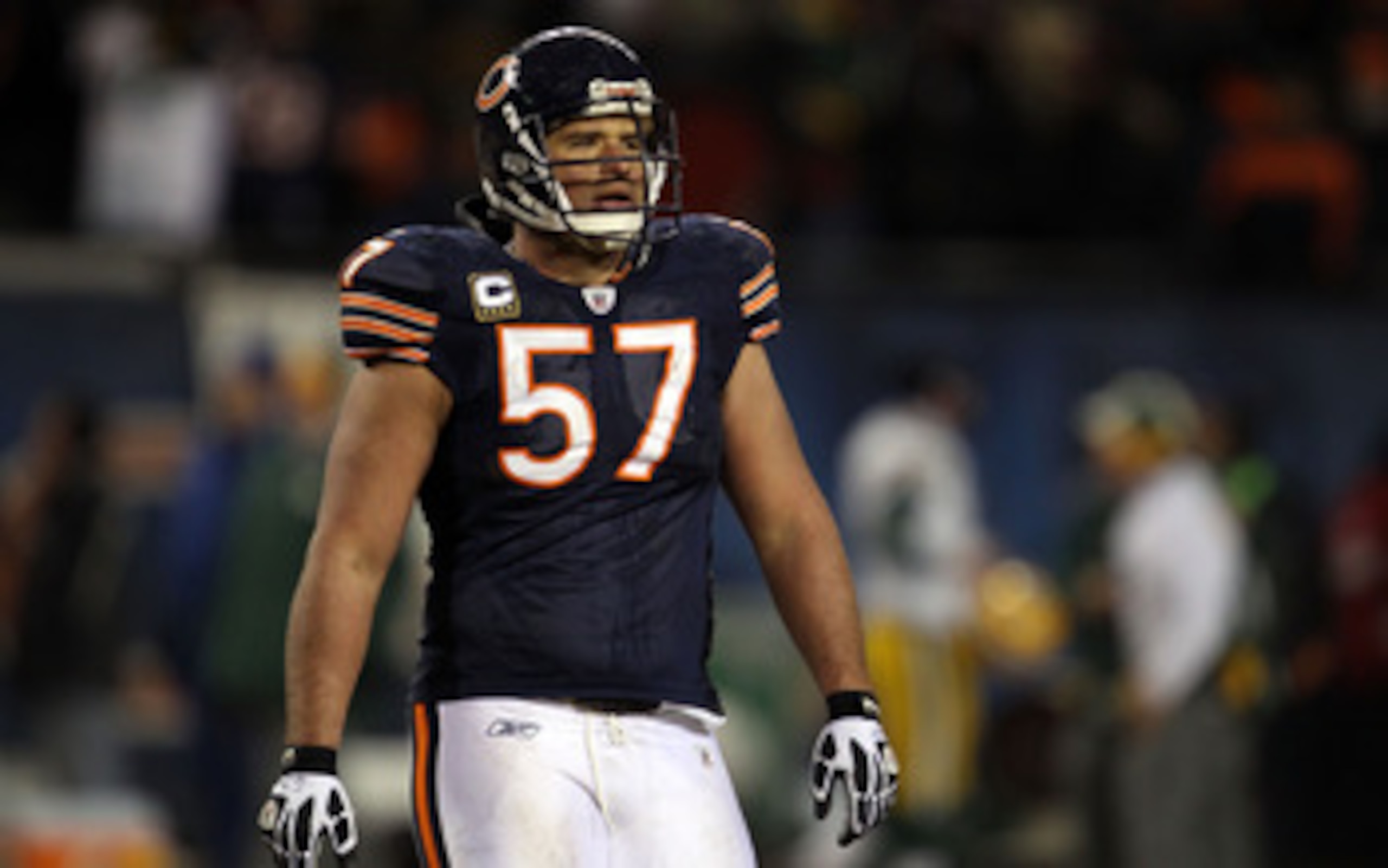 CHICAGO, IL - JANUARY 23:  Olin Kreutz #57 of the Chicago Bears looks on late in the fourth quarter against the Green Bay Packers in the NFC Championship Game at Soldier Field on January 23, 2011 in Chicago, Illinois.  (Photo by Jonathan Daniel/Getty Imag