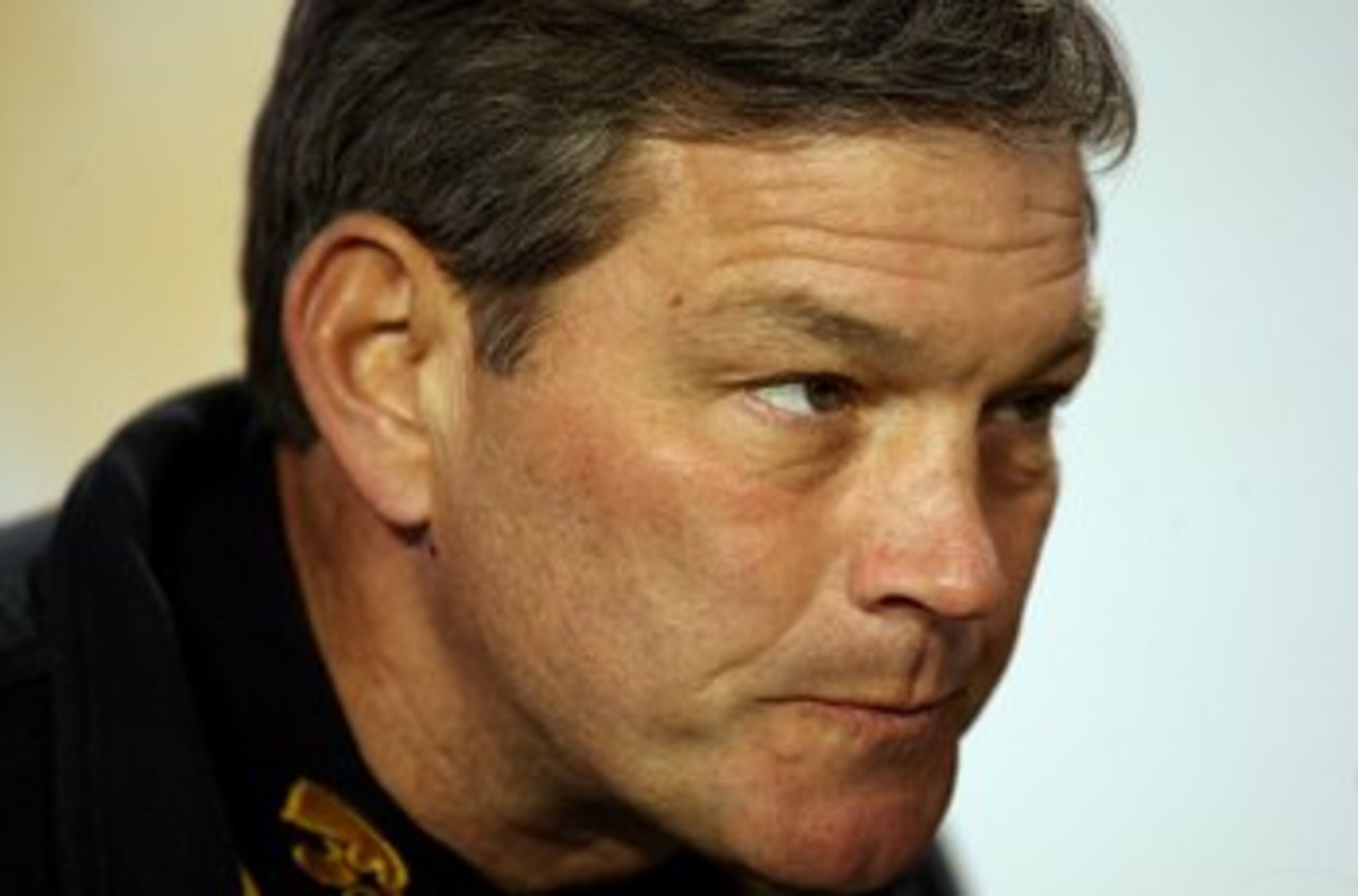 MIAMI GARDENS, FL - JANUARY 05:  Head coach Kirk Ferentz of the Iowa Hawkeyes coaches against the Georgia Tech Yellow Jackets during the FedEx Orange Bowl at Land Shark Stadium on January 5, 2010 in Miami Gardens, Florida. Iowa won 24-14.  (Photo by Marc