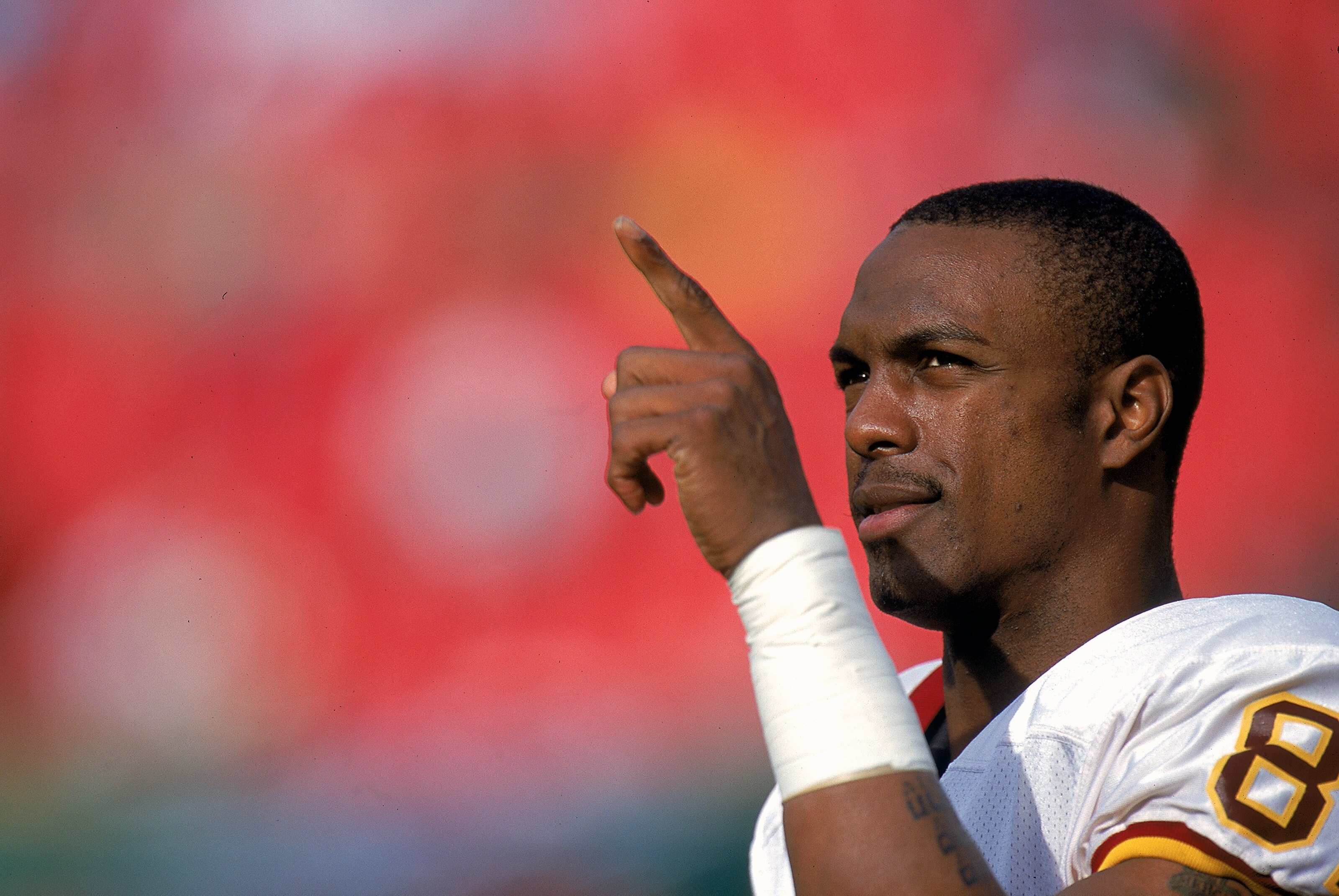 12 Dec 1999: Michael Westbrook #82 of the Washington Redskins points to the crowd during a game against the Arizona Cardinals at the Fed Ex Field in Landover, Maryland. The Redskins defeated the Cardinals 28-3. Mandatory Credit: Doug Pensinger  /Allsport