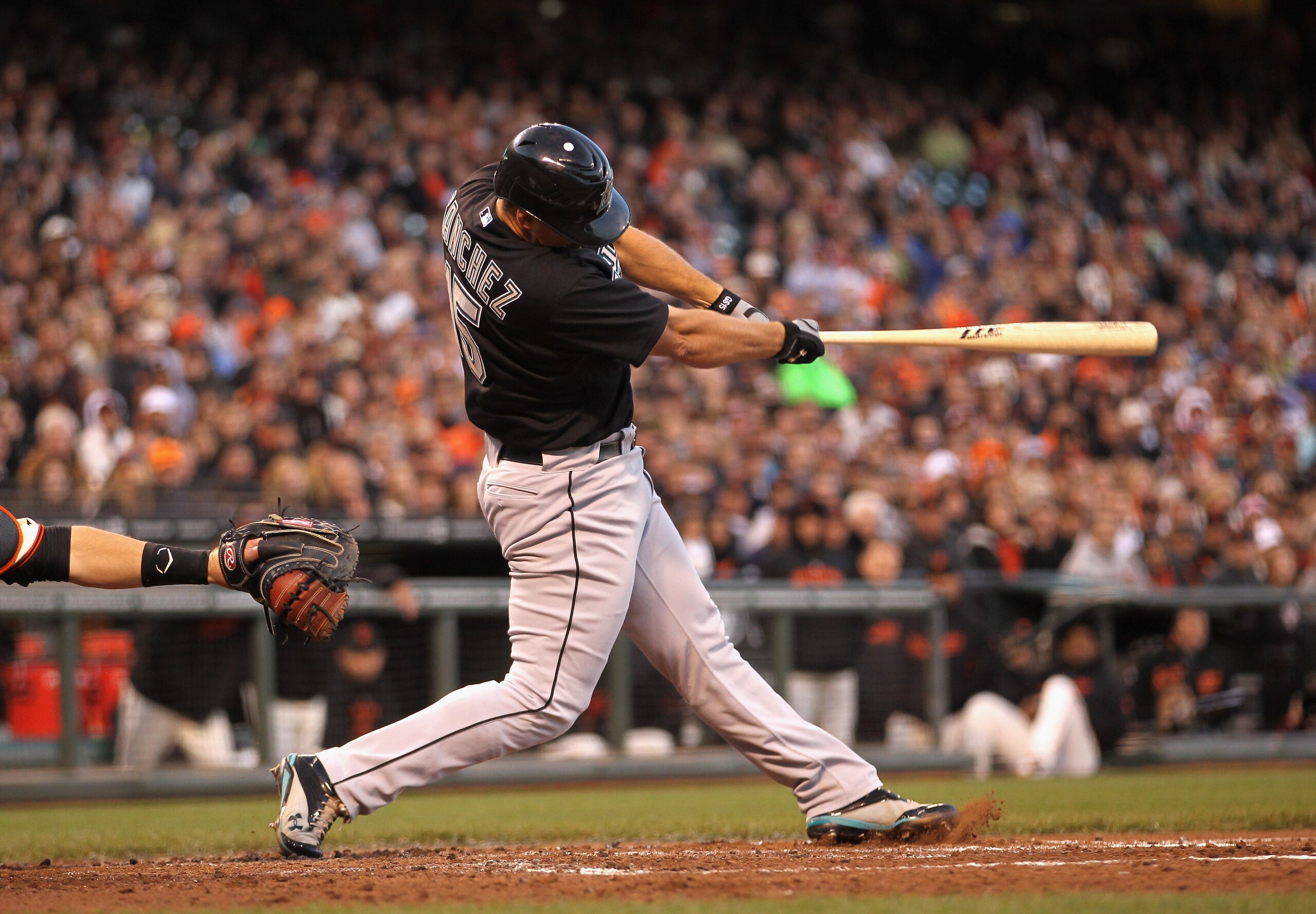 SAN FRANCISCO, CA - MAY 24:  Gaby Sanchez #15 of the Florida Marlins hits a three-run double in the third inning against the San Francisco Giants at AT&T Park on May 24, 2011 in San Francisco, California.  (Photo by Ezra Shaw/Getty Images)