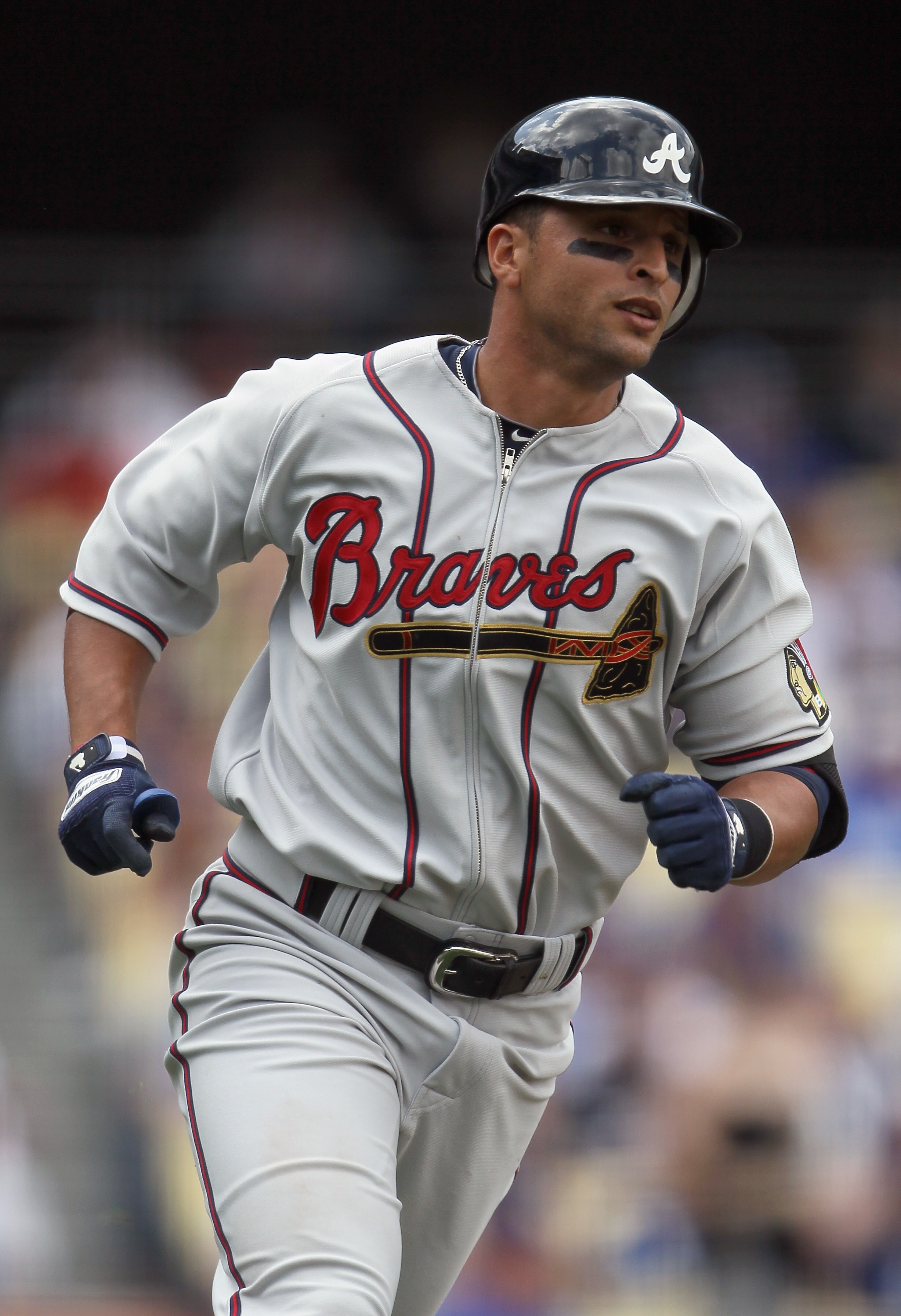 LOS ANGELES, CA - APRIL 21:  Martin Prado #14 of the Atlanta Braves runs to first base against the Los Angeles Dodgers at Dodger Stadium on April 21, 2011 in Los Angeles, California.  (Photo by Jeff Gross/Getty Images)