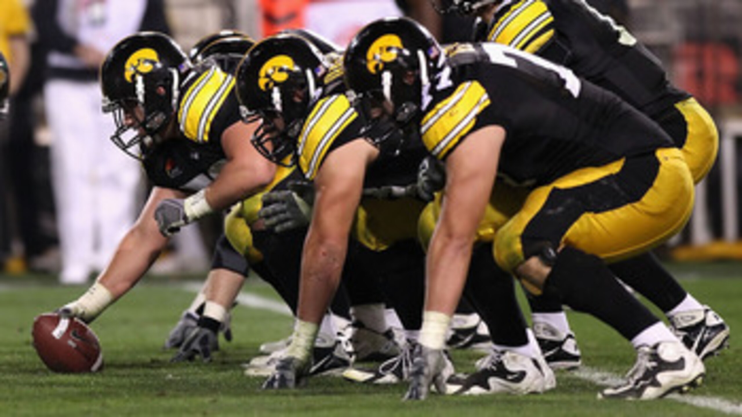 TEMPE, AZ - DECEMBER 28:  Quarterback Ricky Stanzi #12 of the Iowa Hawkeyes prepares to snap the ball during the Insight Bowl against the Missouri Tigers at Sun Devil Stadium on December 28, 2010 in Tempe, Arizona.  The Hawkeyes defeated the Tigers 27-24.