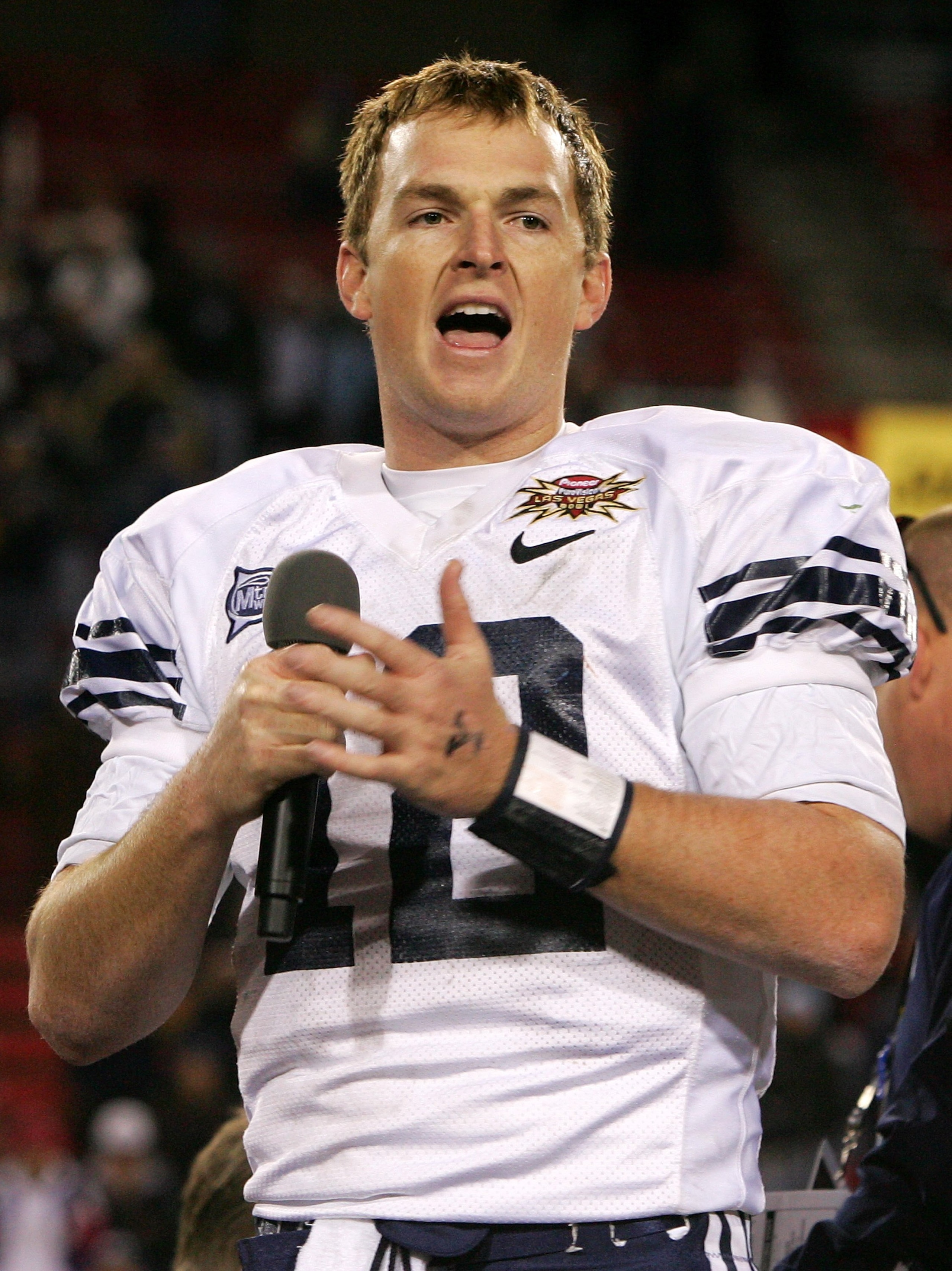 LAS VEGAS - DECEMBER 21:  Brigham Young University quarterback John Beck #12 addresses fans after the Cougars defeated the Oregon Ducks 38-8 in the Pioneer PureVision Las Vegas Bowl at Sam Boyd Stadium December 21, 2006 in Las Vegas, Nevada.  (Photo by Et