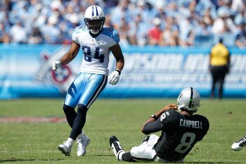 NASHVILLE - SEPTEMBER 12: Chris Hope #24 of the Tennessee Titans forces a slide by Jason Campbell #8 of the Oakland Raiders during the NFL season opener at LP Field on September 12, 2010 in Nashville, Tennessee. The Titans defeated the Raiders 38-13. (Pho