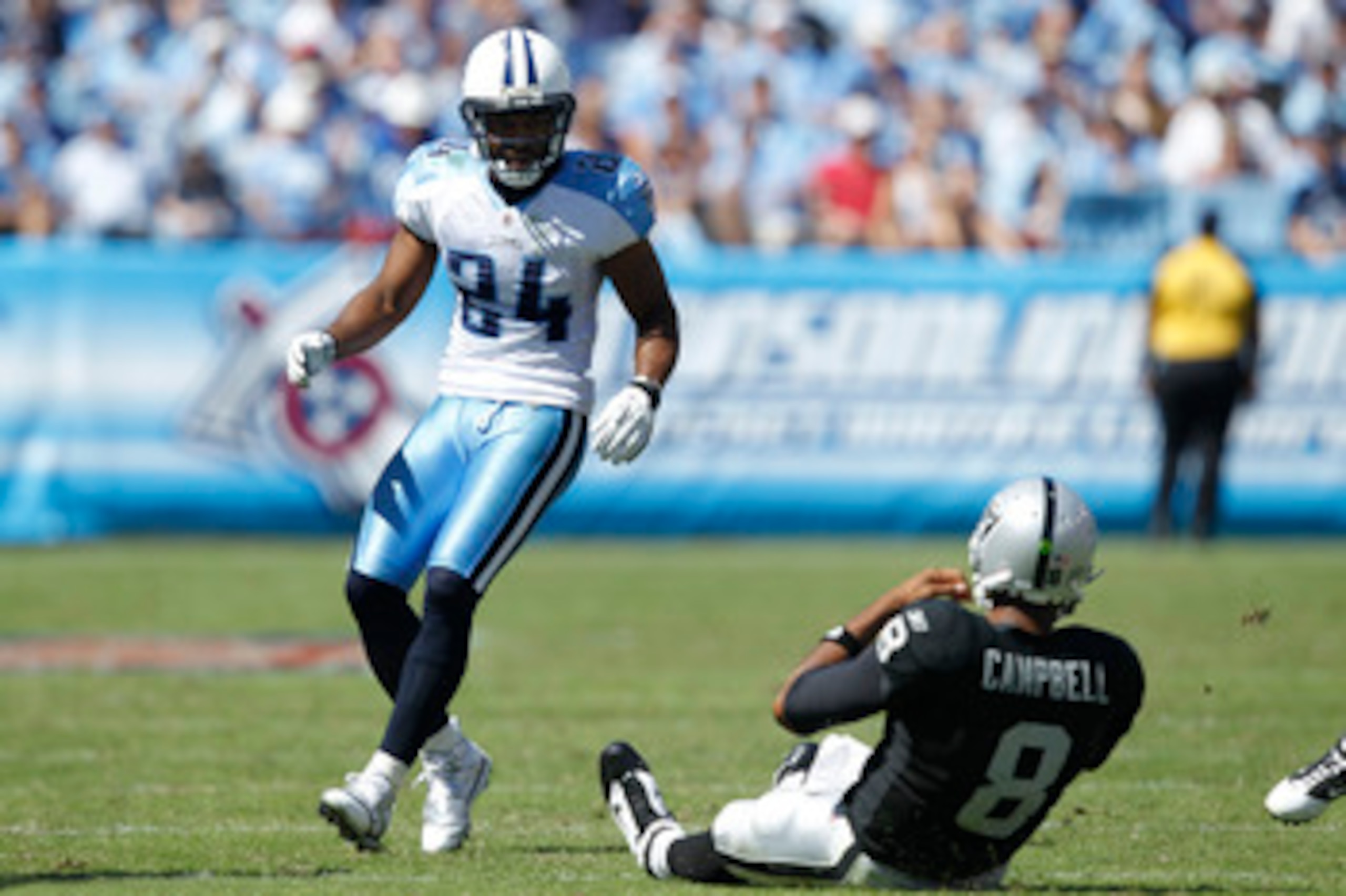 NASHVILLE - SEPTEMBER 12: Chris Hope #24 of the Tennessee Titans forces a slide by Jason Campbell #8 of the Oakland Raiders during the NFL season opener at LP Field on September 12, 2010 in Nashville, Tennessee. The Titans defeated the Raiders 38-13. (Pho