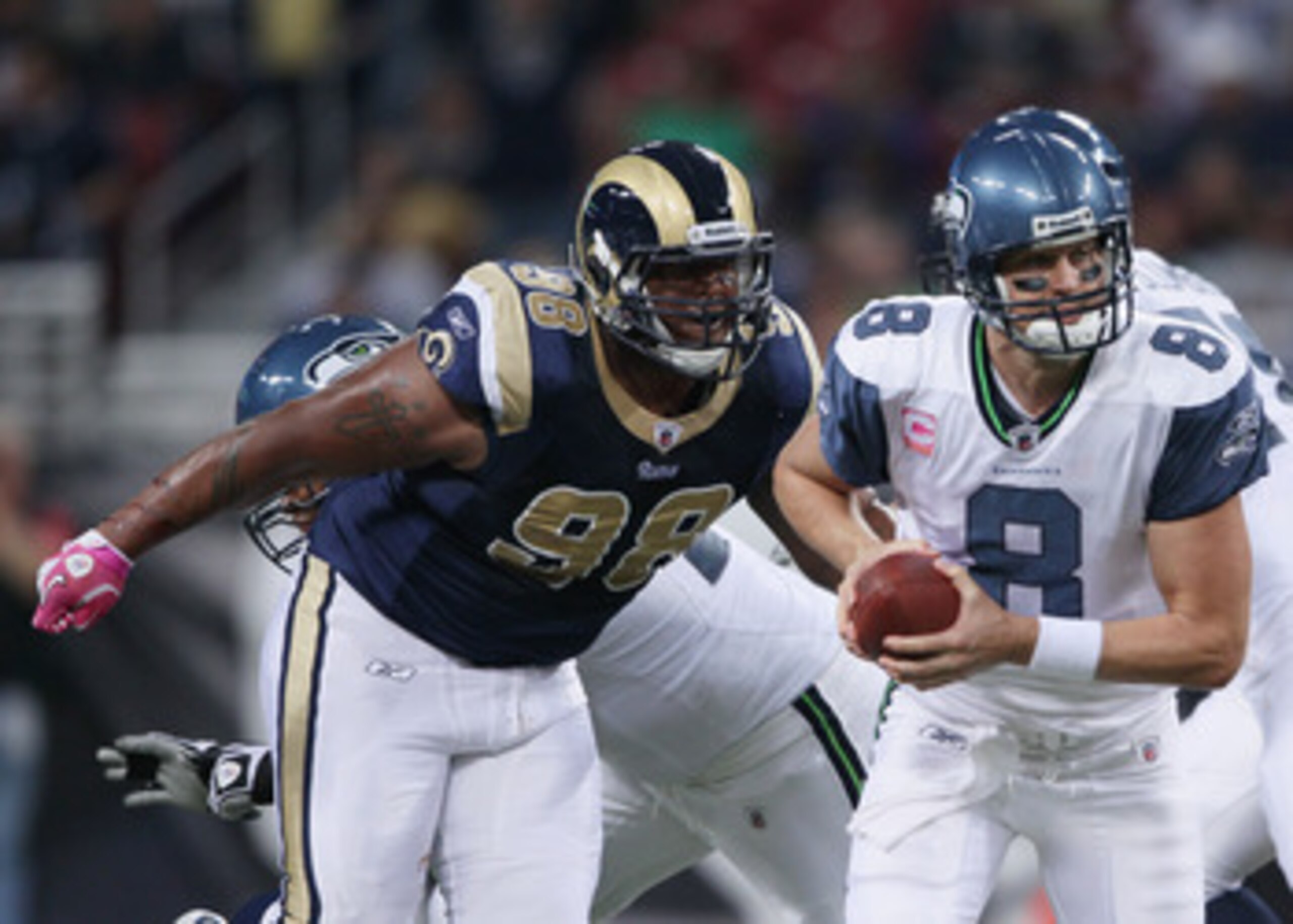 ST. LOUIS - OCTOBER 03:  3: Fred Robbins #98 of the St. Louis Rams sacks Matt Hasselbeck #8 of the Seattle Seahawks on October 3, 2010 at Edward Jones Dome in St. Louis, Missouri.  (Photo by Elsa/Getty Images)