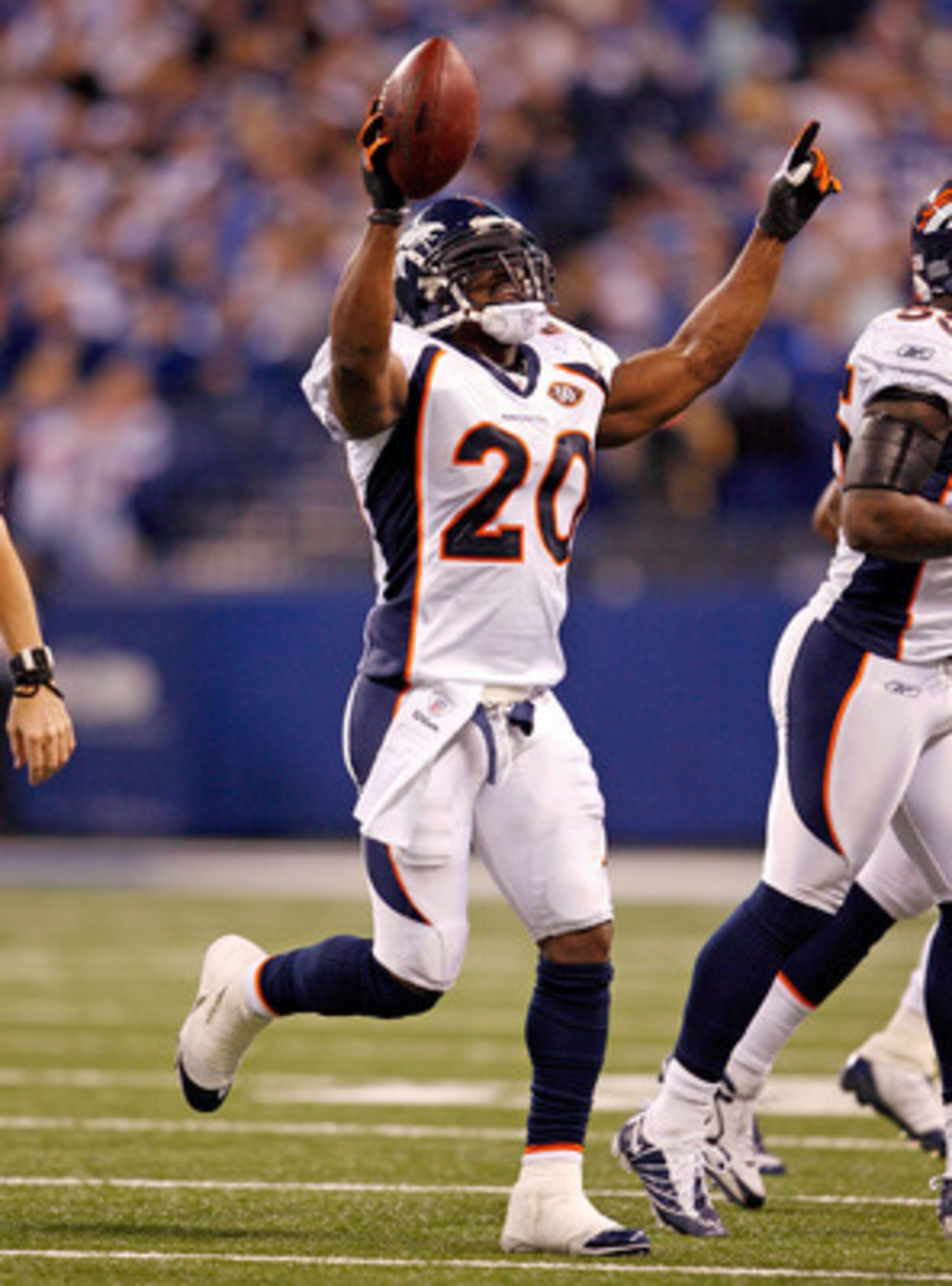 INDIANAPOLIS - DECEMBER 13:  Brian Dawkins #20 of the Denver Broncos celebrates after intercepting a pass during the NFL game against the Indianapolis Colts at Lucas Oil Stadium on December 13, 2009 in Indianapolis, Indiana.  The Colts won 28-16.  (Photo 