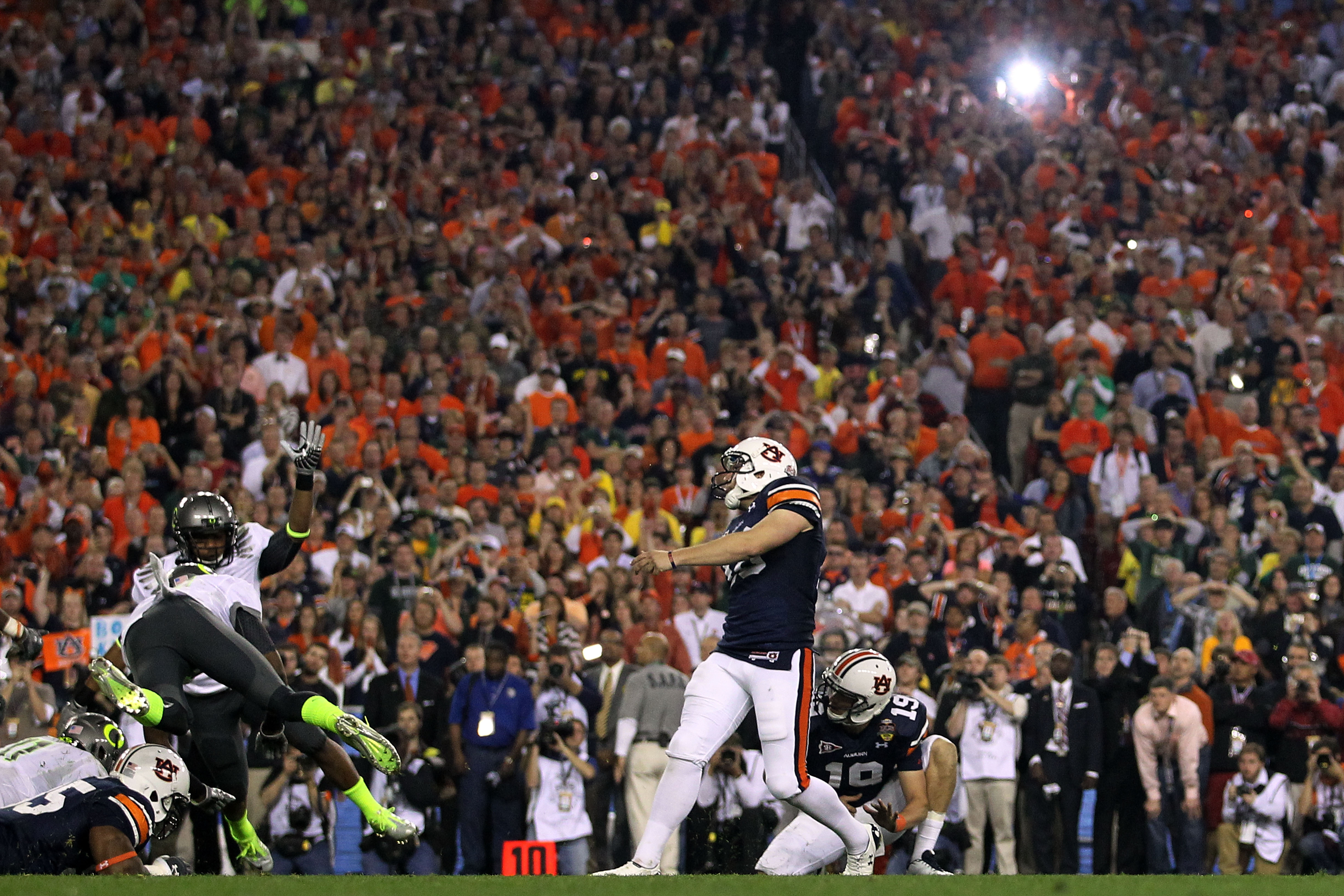 GLENDALE, AZ - JANUARY 10: Kicker Wes Byrum #18 of the Auburn Tigers kicks a 19-yard game-winning field goal to defeat the Oregon Ducks 22-19 in the Tostitos BCS National Championship Game at University of Phoenix Stadium on January 10, 2011 in Glendale, GLENDALE, AZ - JANUARY 10: Kicker Wes Byrum #18 of the Auburn Tigers kicks a 19-yard game-winning field goal to defeat the Oregon Ducks 22-19 in the Tostitos BCS National Championship Game at University of Phoenix Stadium on January 10, 2011 in Glendale,
