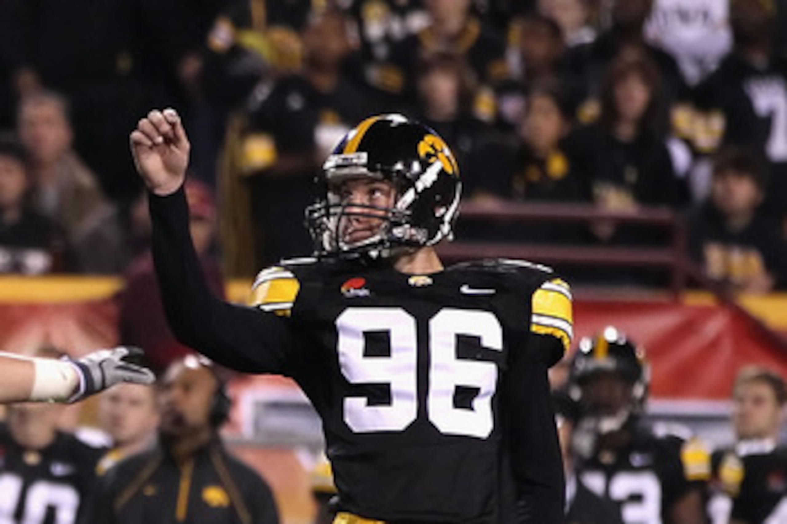 TEMPE, AZ - DECEMBER 28:  Kicker Michael Meyer #96 of the Iowa Hawkeyes kicks a 34 yard field goal against the Missouri Tigers during the Insight Bowl at Sun Devil Stadium on December 28, 2010 in Tempe, Arizona.  (Photo by Christian Petersen/Getty Images)