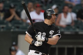 CHICAGO, IL - MAY 22:  Adam Dunn #32 of the Chicago White Sox hits a run-scoring single in the 8th inning against the Los Angeles Dodgers at U.S. Cellular Field on May 22, 2011 in Chicago, Illinois. The White Sox defeated the Dodgers 8-3.  (Photo by Jonat