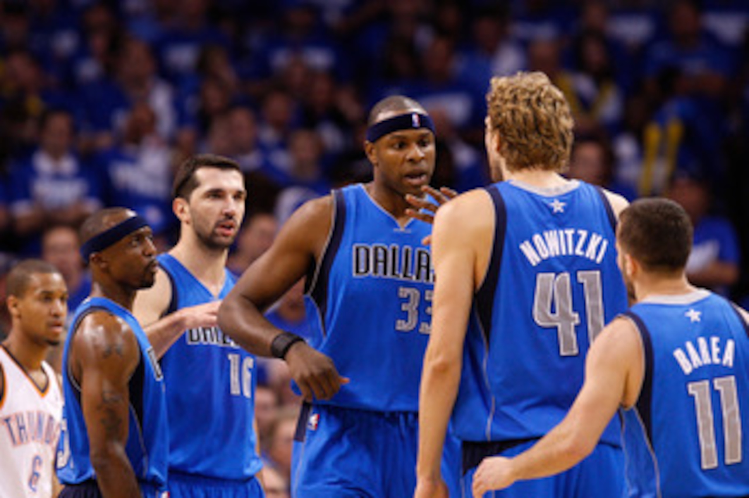 OKLAHOMA CITY, OK - MAY 21: (L-R) Jason Terry #31, Peja Stojakovic #16, Brendan Haywood #33, Dirk Nowitzki #41 and Jose Juan Barea #11 of the Dallas Mavericks celebrate on the court in the second quarter while taking on the Oklahoma City Thunder in Game OKLAHOMA CITY, OK - MAY 21: (L-R) Jason Terry #31, Peja Stojakovic #16, Brendan Haywood #33, Dirk Nowitzki #41 and Jose Juan Barea #11 of the Dallas Mavericks celebrate on the court in the second quarter while taking on the Oklahoma City Thunder in Game
