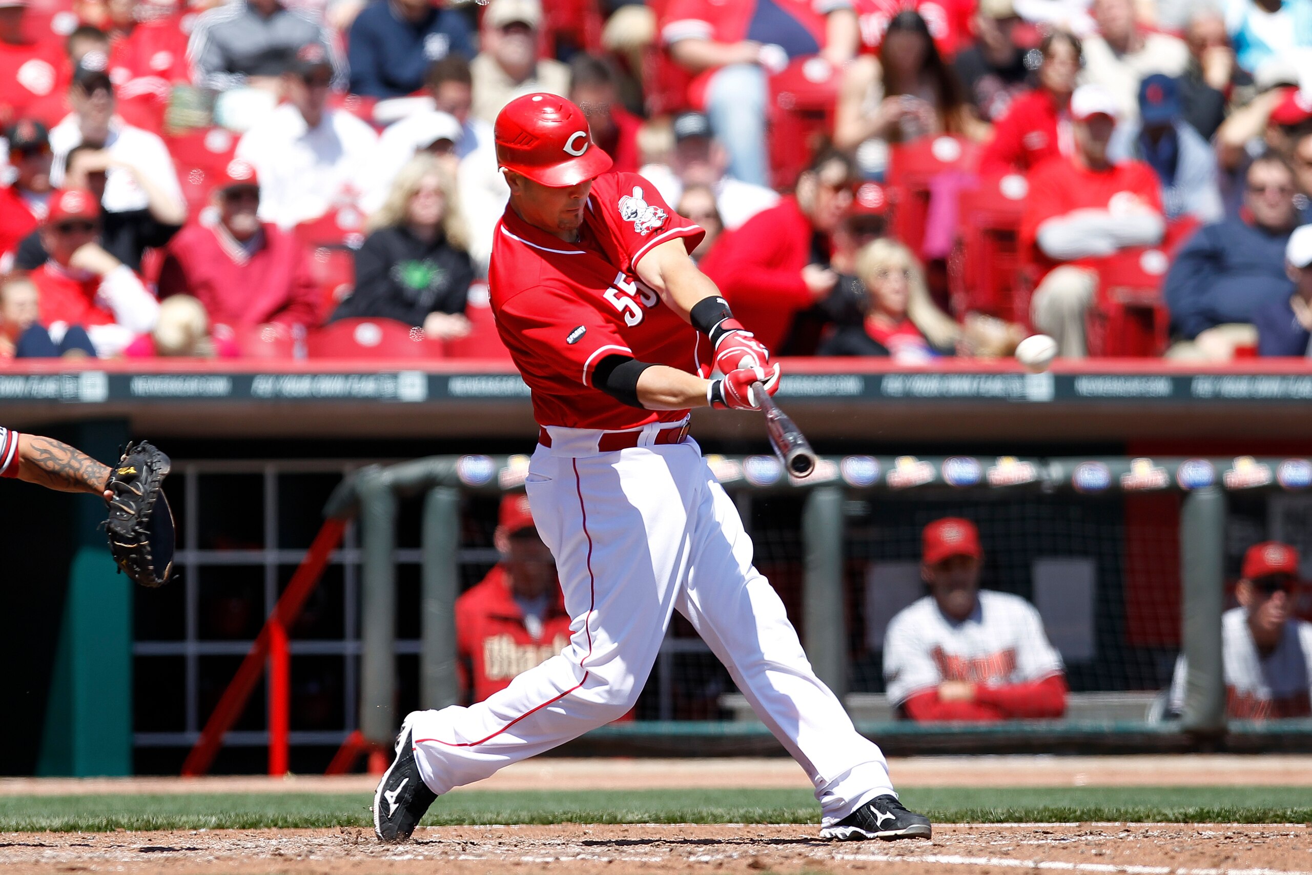 CINCINNATI, OH - APRIL 21: Ramon Hernandez #55 of the Cincinnati Reds drives in a run with a double off the wall in the sixth inning against the Arizona Diamondbacks at Great American Ball Park on April 21, 2011 in Cincinnati, Ohio. The Reds defeated the