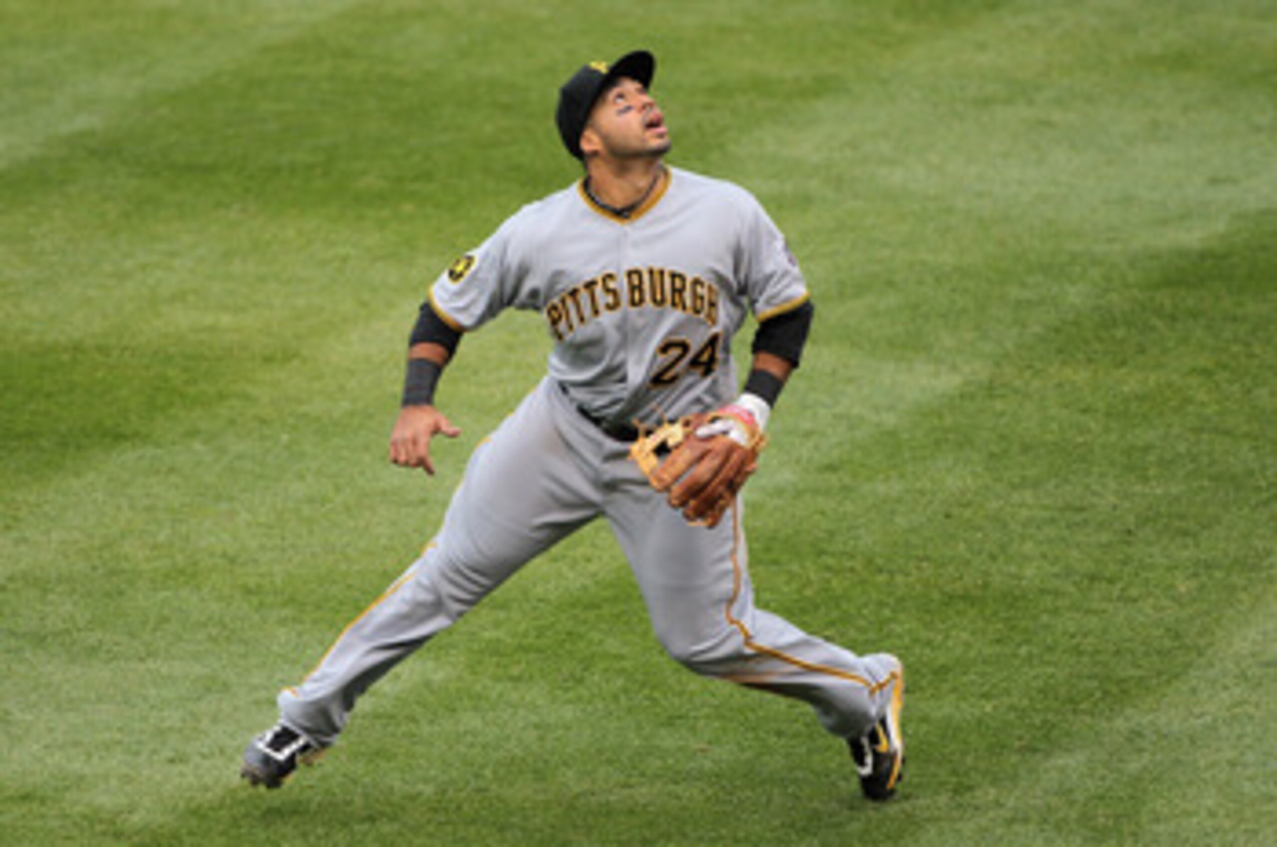 DENVER, CO - MAY 01:  Third baseman Pedro Alvarez #24 of the Pittsburgh Pirates tracks down a pop foul against the Colorado Rockies at Coors Field on May 1, 2011 in Denver, Colorado. The Pirates defeated the Rockies 8-4.  (Photo by Doug Pensinger/Getty Im