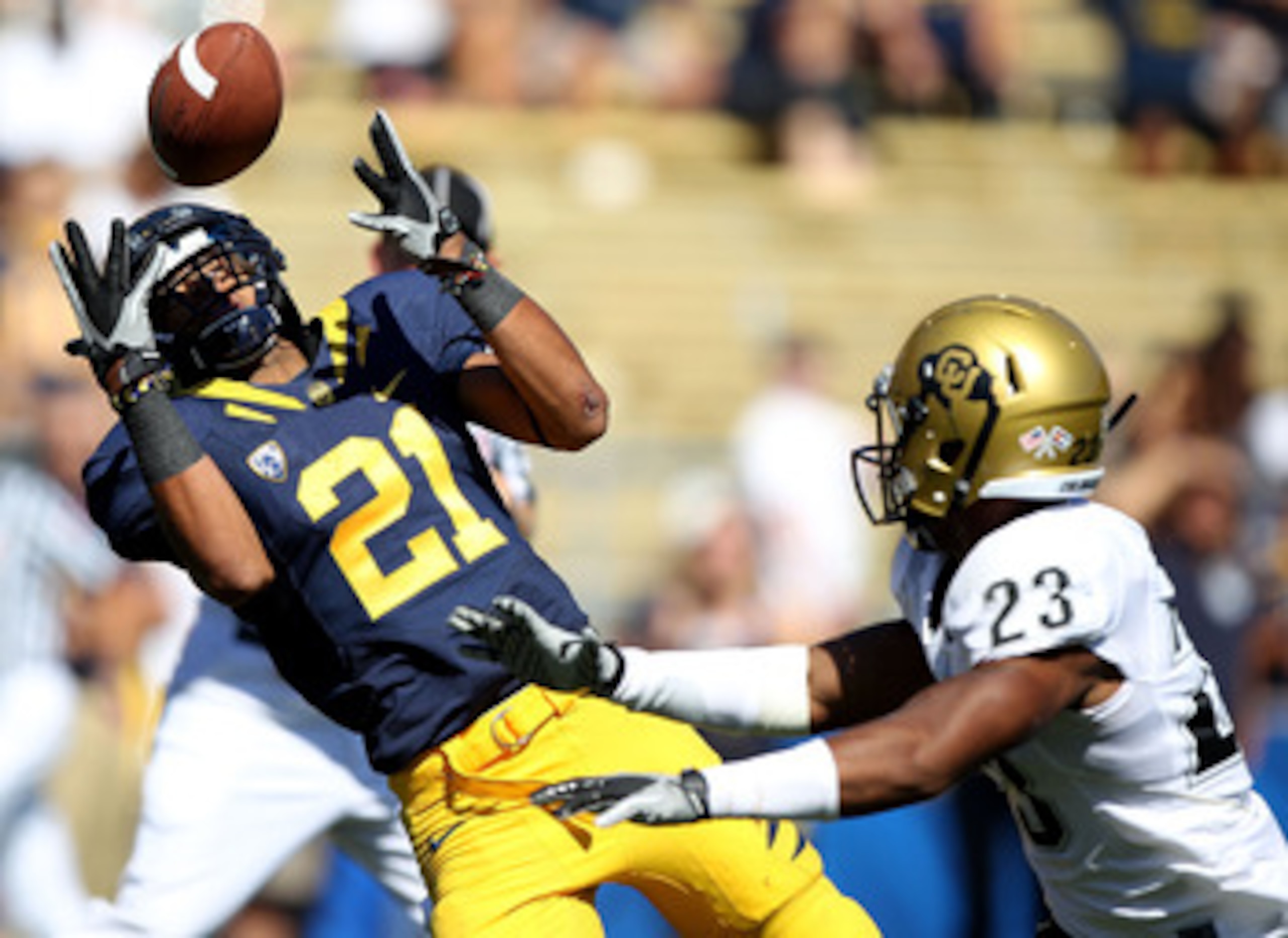 BERKELEY, CA - SEPTEMBER 11: Keenan Allen #21 of the California Golden Bears can't catch a pass as Jalil Brown #23 of the Colorado Buffaloes defends at California Memorial Stadium on September 11, 2010 in Berkeley, California. (Photo by Jed Jacobsohn/Gett