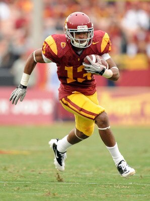 LOS ANGELES, CA - OCTOBER 16:  Robert Woods #13 of the USC Trojans carries the ball during the game against the California Golden Bears at Los Angeles Memorial Coliseum on October 16, 2010 in Los Angeles, California.  (Photo by Harry How/Getty Images)