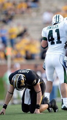 COLUMBIA, MO - NOVEMBER 07:  Baylor Bears players celebrate after sacking quarterback Blaine Gabbert #11 of the Missouri Tigers during the second half of the game at Faurot Field at Memorial Stadium on November 7, 2009 in Columbia, Missouri.  (Photo by Ja
