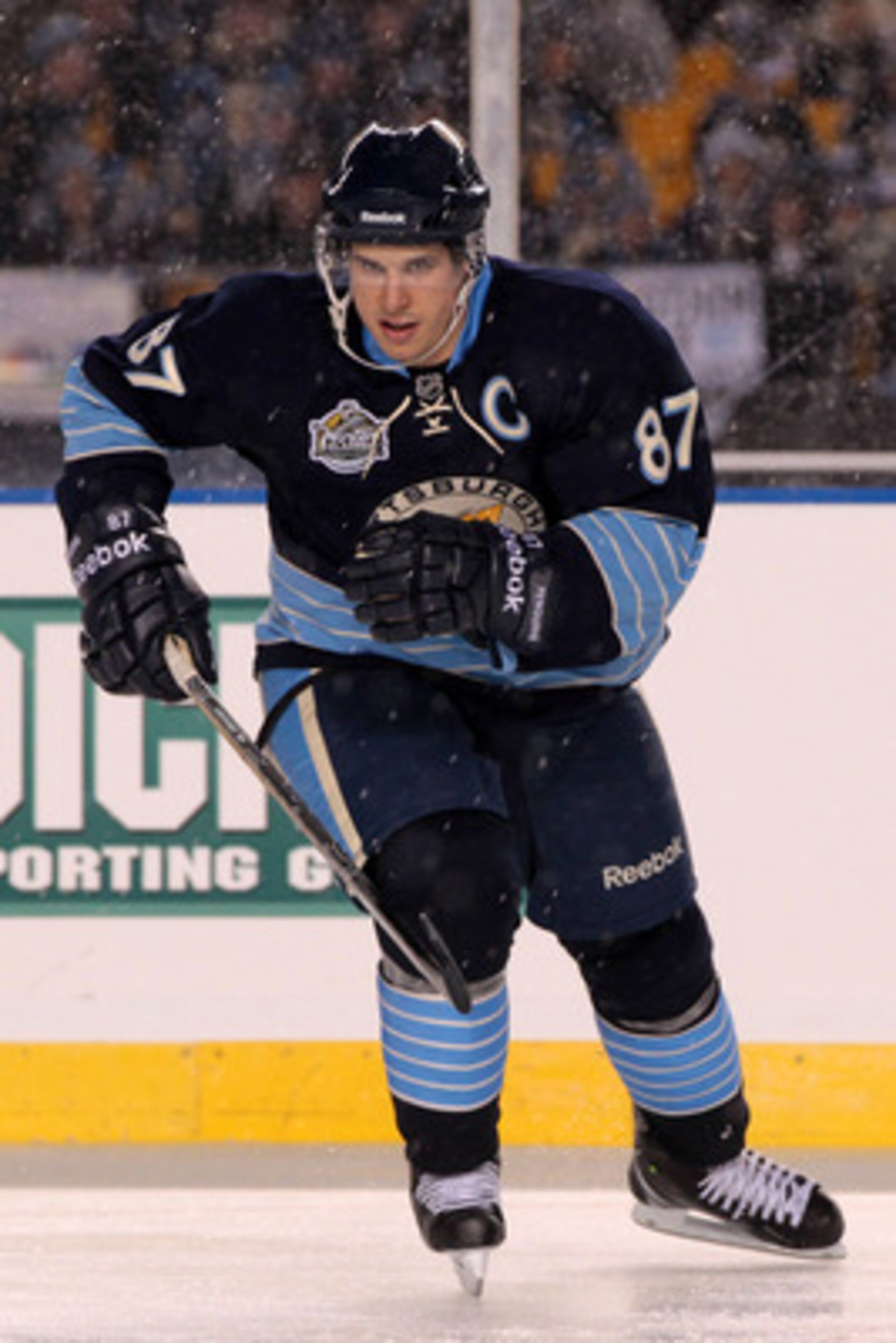 PITTSBURGH, PA - JANUARY 01:  Sidney Crosby #87 of the Pittsburgh Penguins skates against the Washington Capitals during the 2011 NHL Bridgestone Winter Classic at Heinz Field on January 1, 2011 in Pittsburgh, Pennsylvania. Washington won 3-1.  (Photo by 
