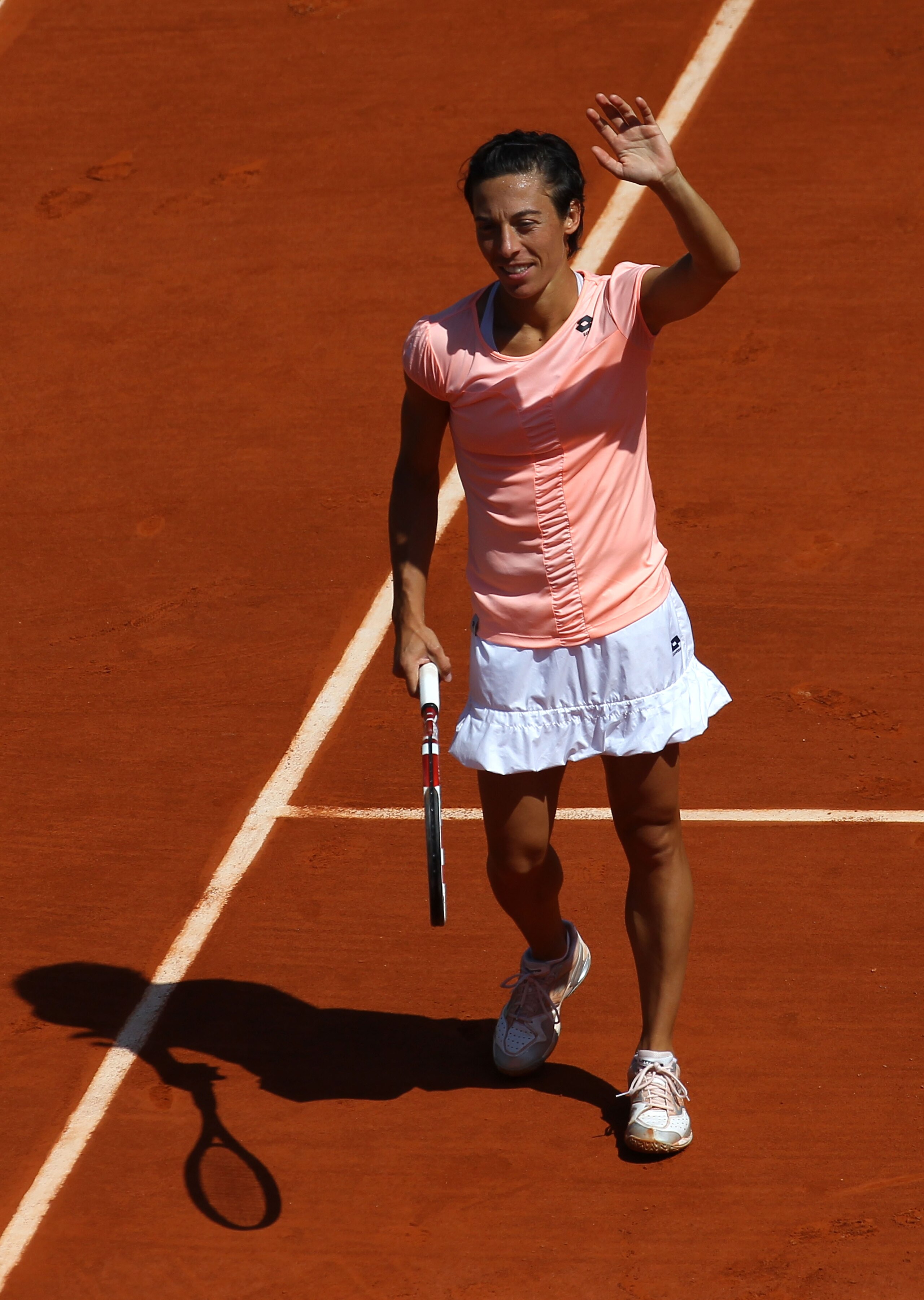 PARIS, FRANCE - MAY 23:  Francesca Schiavone of Italy celebrates match point during the women's singles round one match between Melanie Oudin of USA and Francesca Schiavone of Italy on day two of the French Open at Roland Garros on May 23, 2011 in Paris,