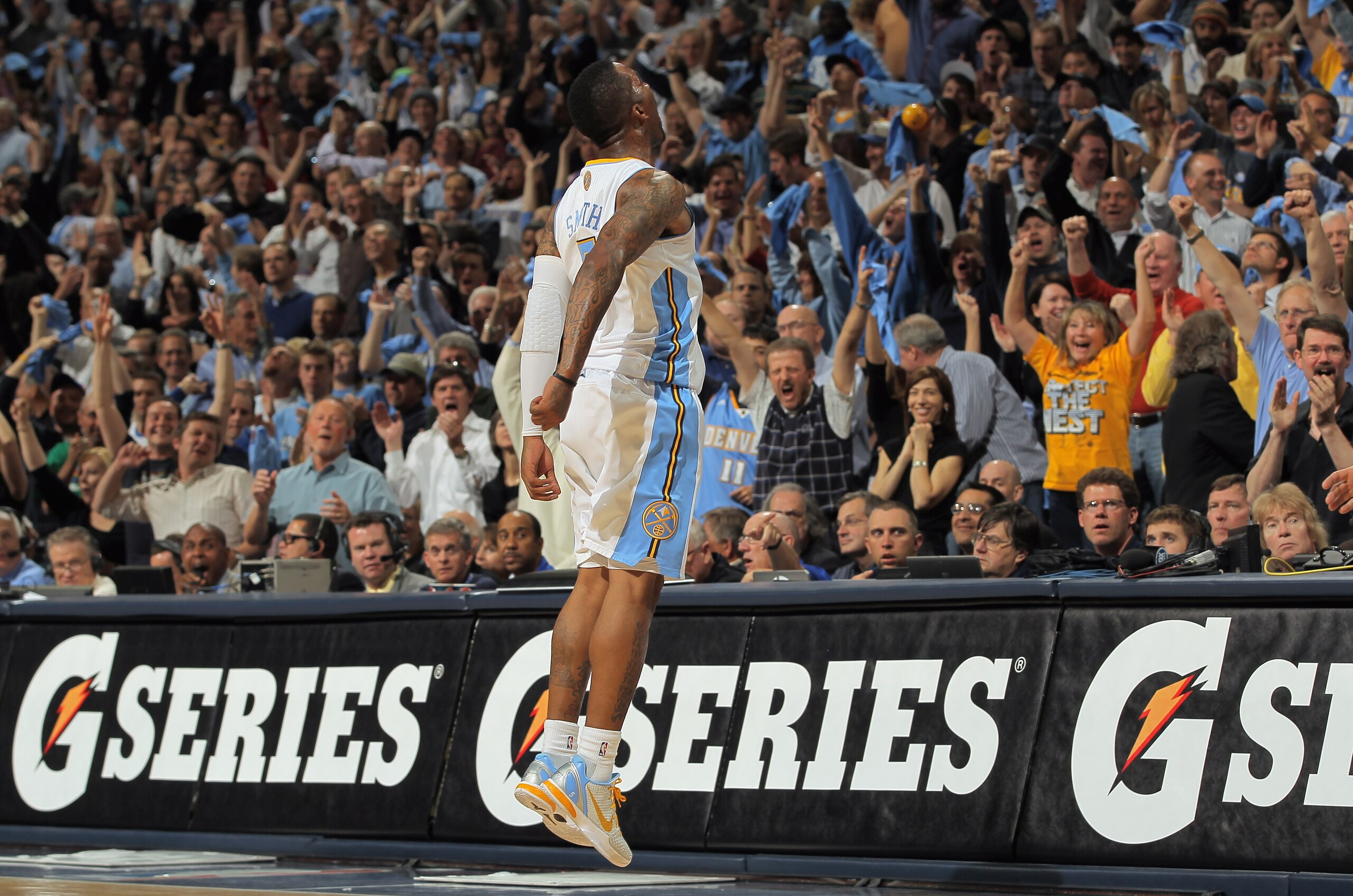 DENVER, CO - APRIL 25:  J.R. Smith #5 of the Denver Nuggets excites the fans as he celebrates making a three point shot against the Oklahoma City Thunder in Game Four of the Western Conference Quarterfinals in the 2011 NBA Playoffs on April 24, 2011 at th