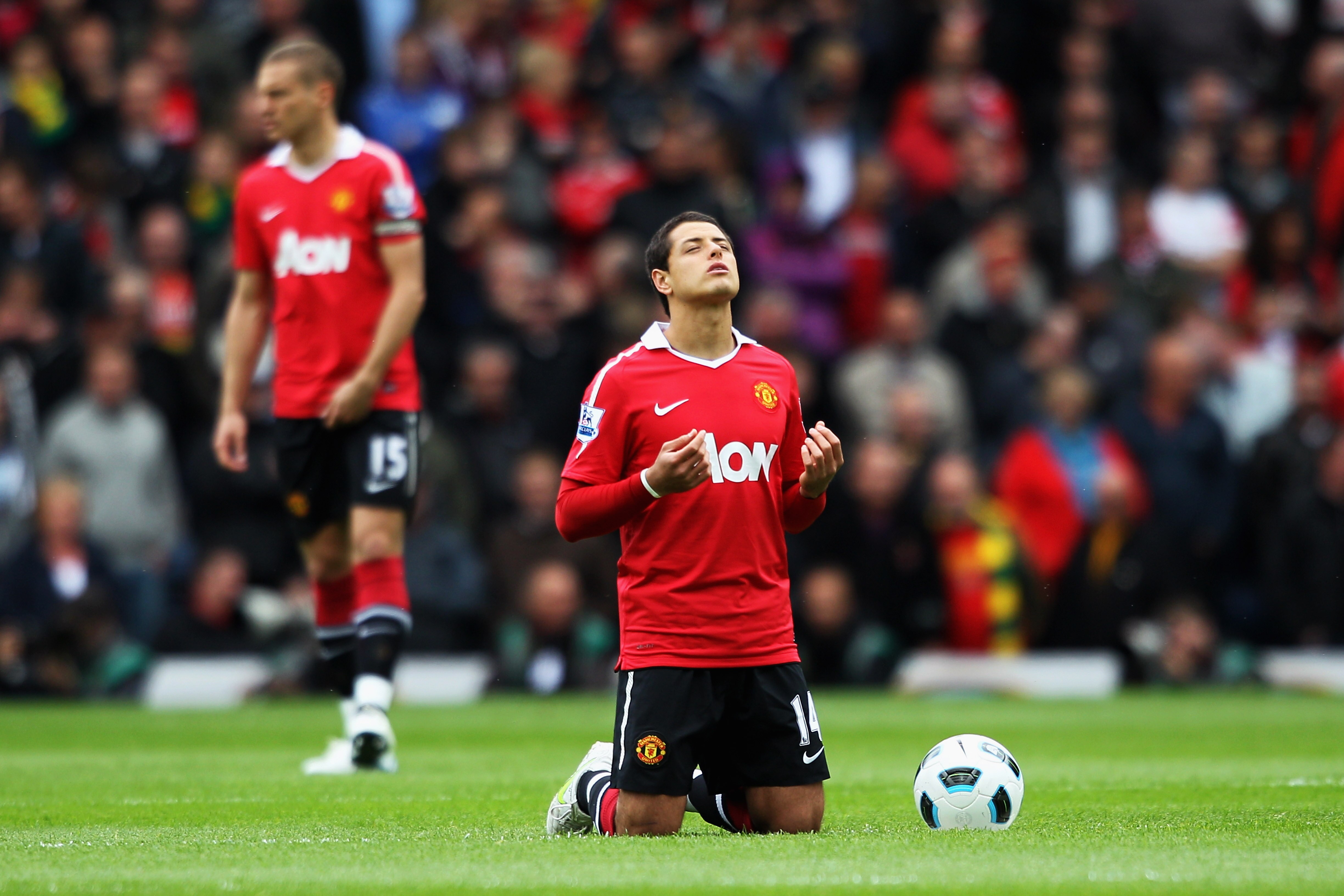 BLACKBURN, ENGLAND - MAY 14:  Javier Hernandez of Manchester United kneels in prayer prior to the Barclays Premier League match between Blackburn Rovers and Manchester United at Ewood park on May 14, 2011 in Blackburn, England.  (Photo by Dean Mouhtaropou