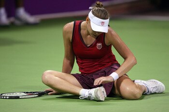 DOHA, QATAR - OCTOBER 29:  Vera Zvonareva of Russia shows her dejection against Caroline Wozniacki of Denmark in their round robin match during the Sony Ericsson Championships at the Khalifa Tennis and Squash Complex on October 29, 2009 in Doha, Qatar.  (