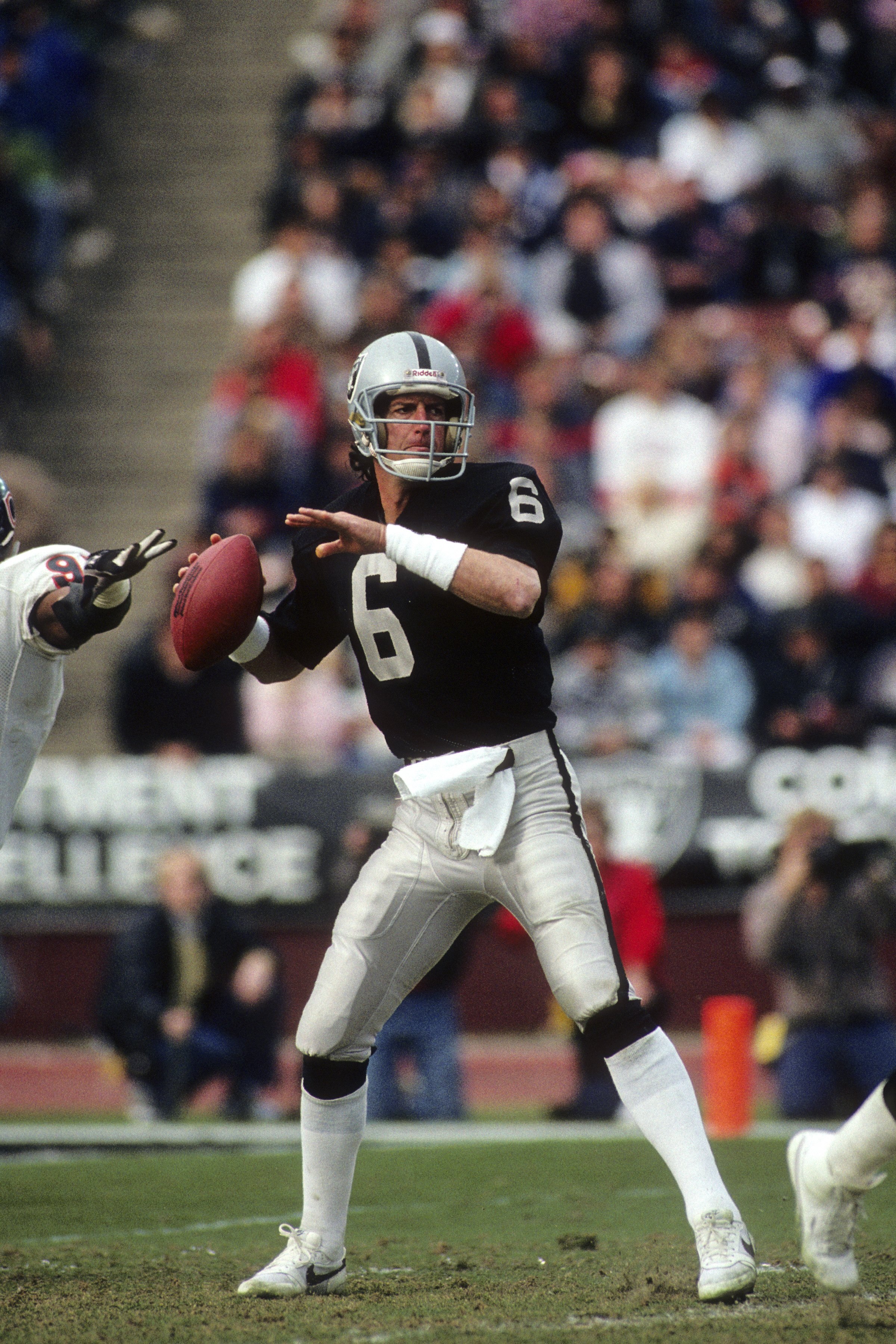 LOS ANGELES - DECEMBER 27: Quarterback Marc Wilson #6 of the Los Angeles Raiders looks to pass the ball against the Chicago Bears during the game at the Los Angeles Memorial Coliseum on December 27, 1987 in Los Angeles, California. The Bears won 6-3. ( LOS ANGELES - DECEMBER 27: Quarterback Marc Wilson #6 of the Los Angeles Raiders looks to pass the ball against the Chicago Bears during the game at the Los Angeles Memorial Coliseum on December 27, 1987 in Los Angeles, California. The Bears won 6-3. (