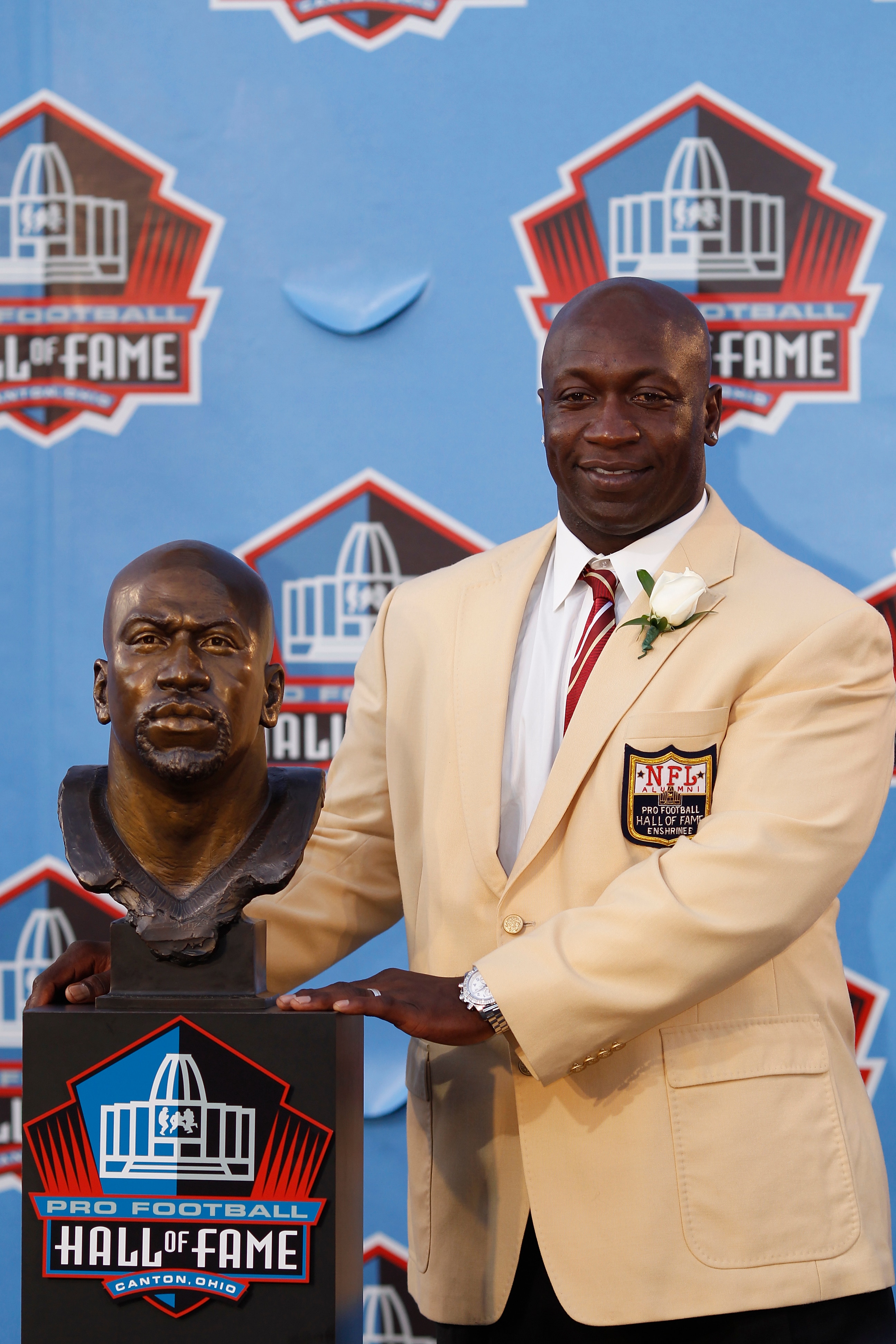 CANTON, OH - AUGUST 7: John Randle poses with his bust during the 2010 Pro Football Hall of Fame Enshrinement Ceremony at the Pro Football Hall of Fame Field at Fawcett Stadium on August 7, 2010 in Canton, Ohio. (Photo by Joe Robbins/Getty Images)