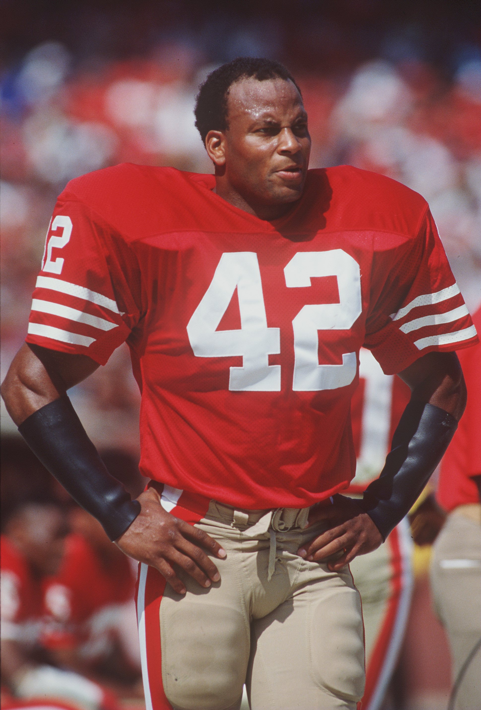 23 Sep 1990:  Strong safety Ronnie Lott of the San Francisco 49ers stands and relaxes on the sideline while the offense is on the field during the 49ers 19-13 victory over the Atlanta Falcons at Candlestick Park in San Francisco, California.   MandatoryCr