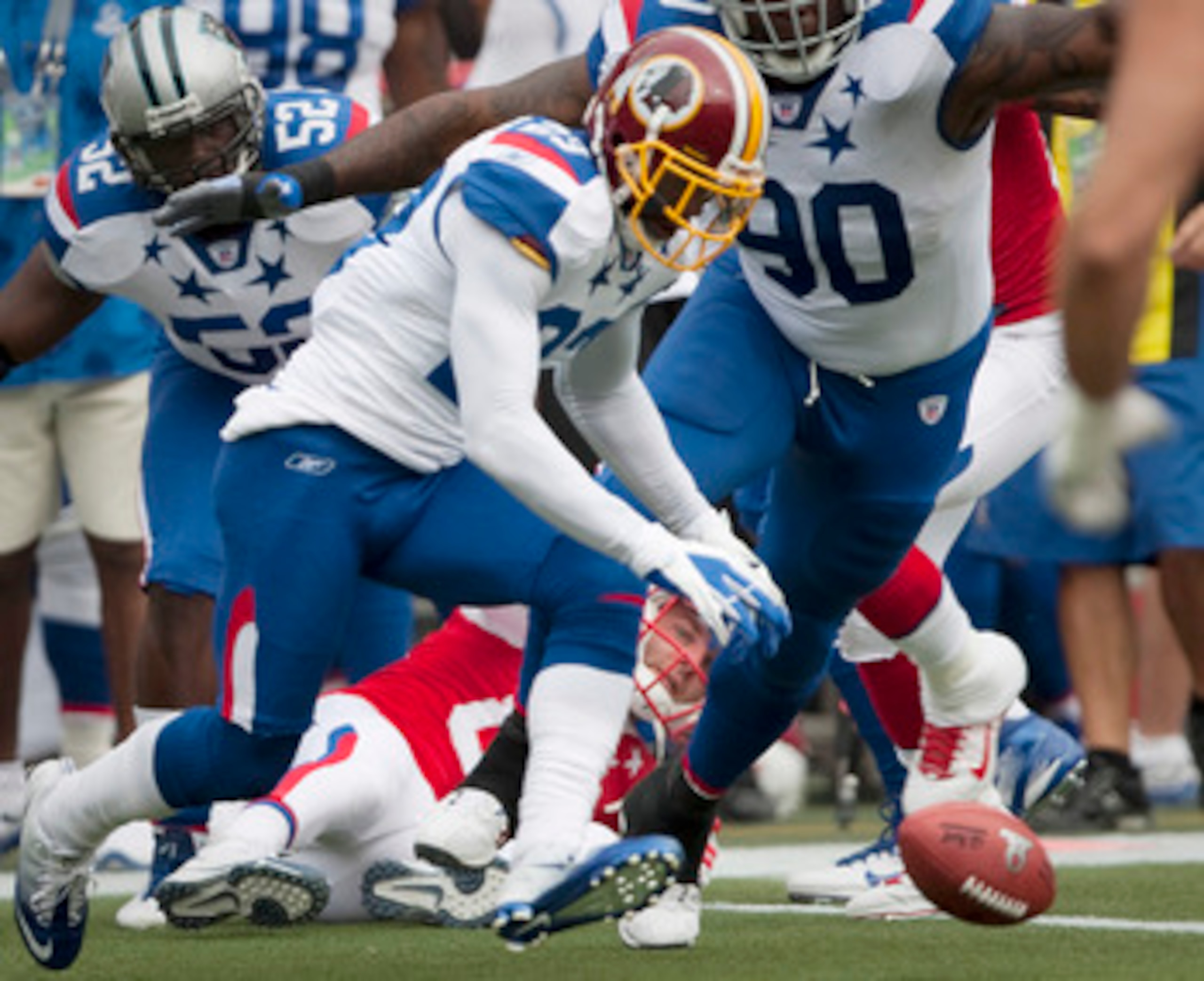 HONOLULU - JANUARY 30:  DeAngelo Hall, #23 of the Washington Redskins chases a loose ball during the 2011 NFL Pro Bowl against the American Football Conference (AFC) at Aloha Stadium on January 30, 2011 in Honolulu, Hawaii.  (Photo by Kent Nishimura/Getty