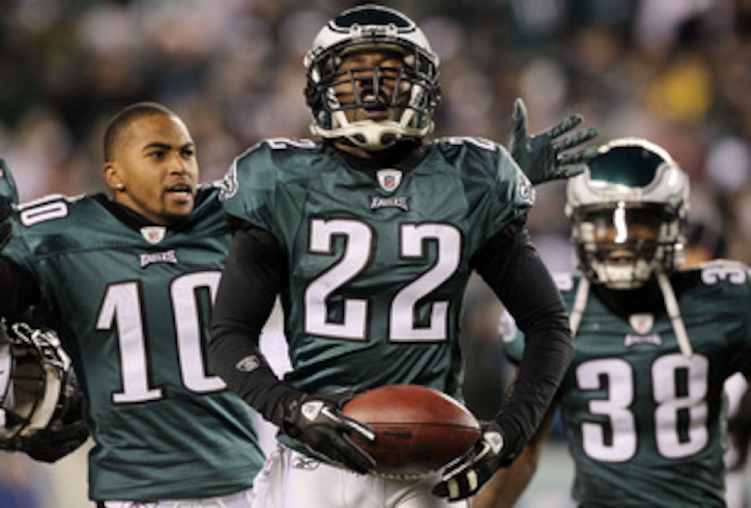 PHILADELPHIA - NOVEMBER 07:  Asante Samuel #22 of the Philadelphia Eagles celebrates his last minute interception that clinched their victory against the Indianapolis Colts with teammates DeSean Jackson #10 and Jorrick Calvin #38 on November 7, 2010 at Li