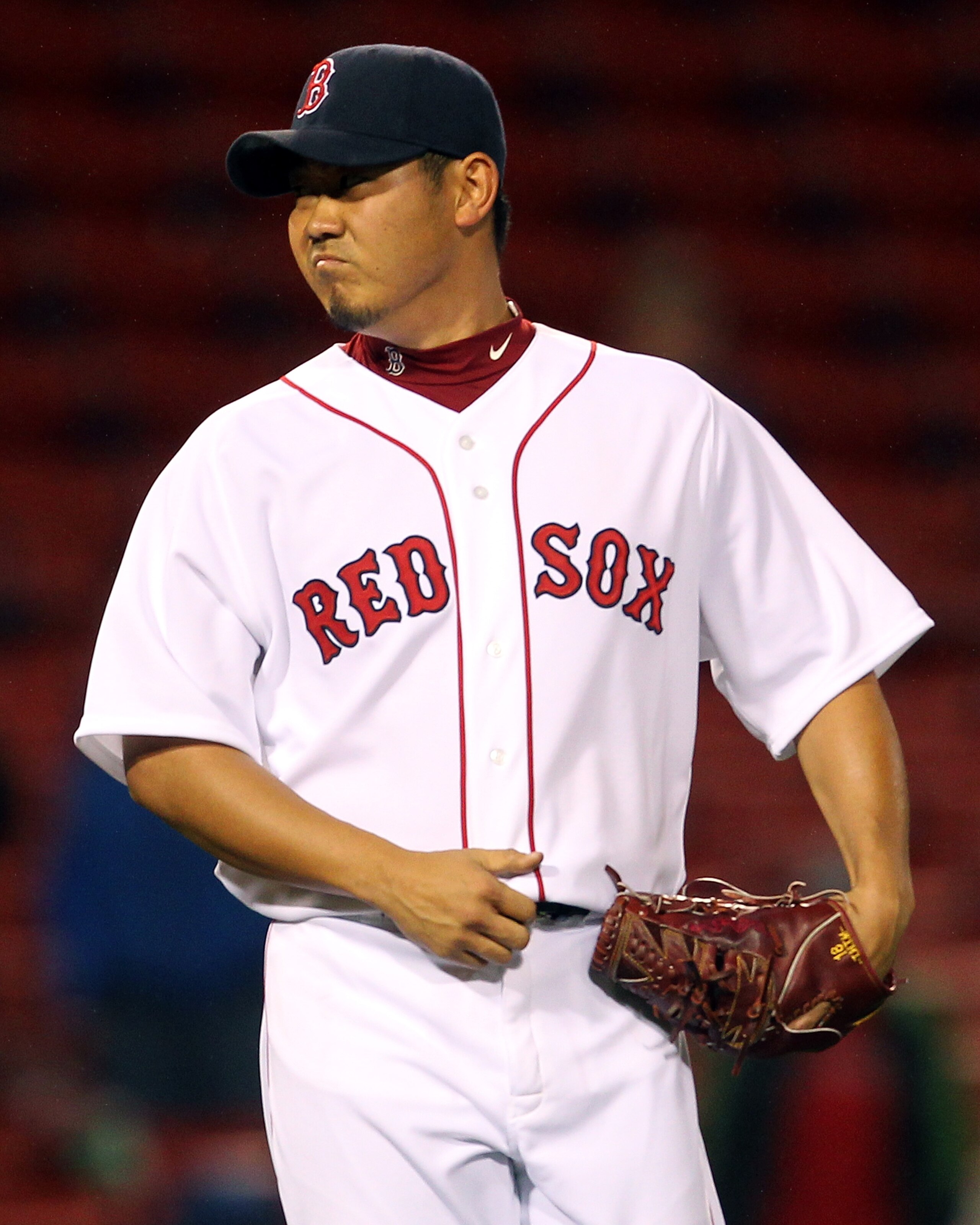 BOSTON, MA - MAY 04: Daisuke Matsuzaka #18 of the Boston Red Sox reacts after giving up a single to Peter Bourjos #25 of the Los Angeles Angels of Anaheim in the 13th inning at Fenway Park on May 4, 2011 in Boston, Massachusetts. (Photo by Jim Rogash/Get BOSTON, MA - MAY 04: Daisuke Matsuzaka #18 of the Boston Red Sox reacts after giving up a single to Peter Bourjos #25 of the Los Angeles Angels of Anaheim in the 13th inning at Fenway Park on May 4, 2011 in Boston, Massachusetts. (Photo by Jim Rogash/Get