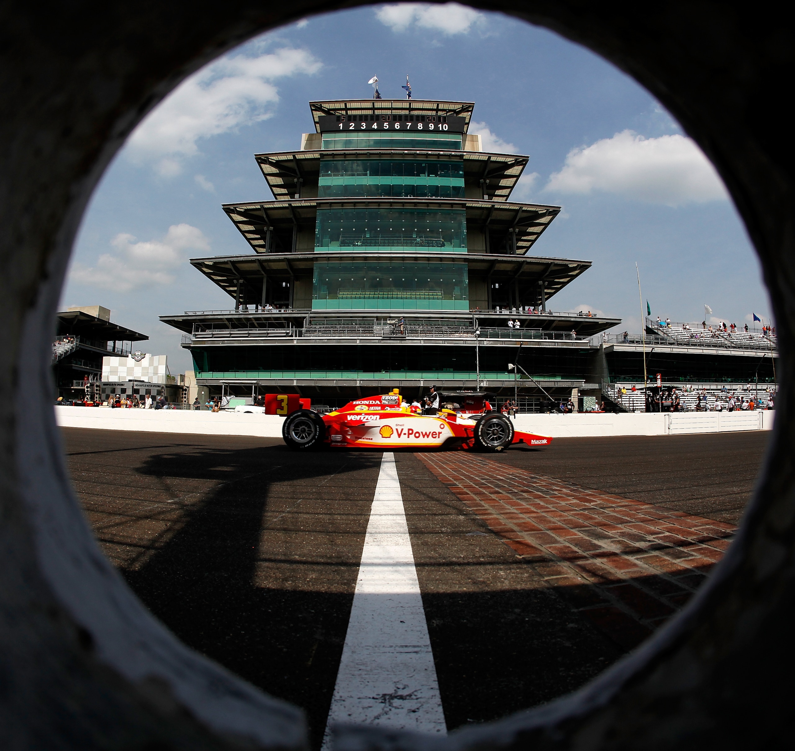 INDIANAPOLIS - MAY 20:  Helio Castroneves drives his #3 Shell V Power/ Pennzoil Ultra Team Penske Dallra Honda during practice for the the 95th Indianapolis 500 Mile Race at the Indianapolis Motor Speedway on May 20, 2011 in Indianapolis, Indiana.  (Photo