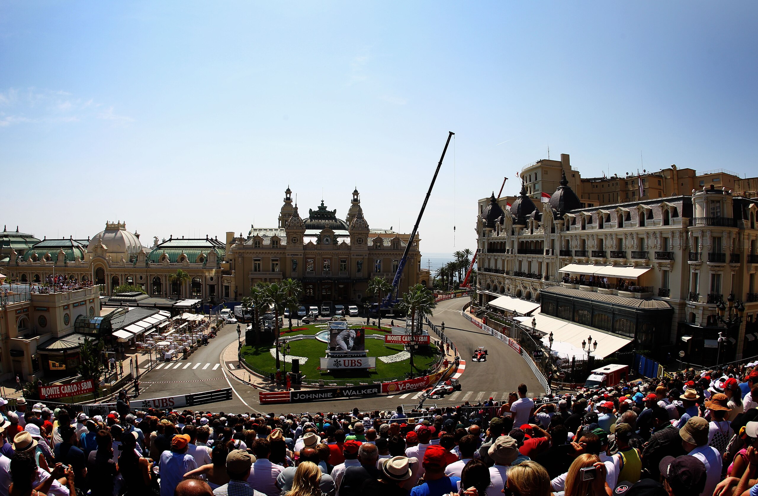 MONTE CARLO, MONACO - MAY 26:  Fernando Alonso of Spain and Ferrari drives through Casino Square during practice for the Monaco Formula One Grand Prix at the Monte Carlo Circuit on May 26, 2011 in Monte Carlo, Monaco.  (Photo by Paul Gilham/Getty Images)
