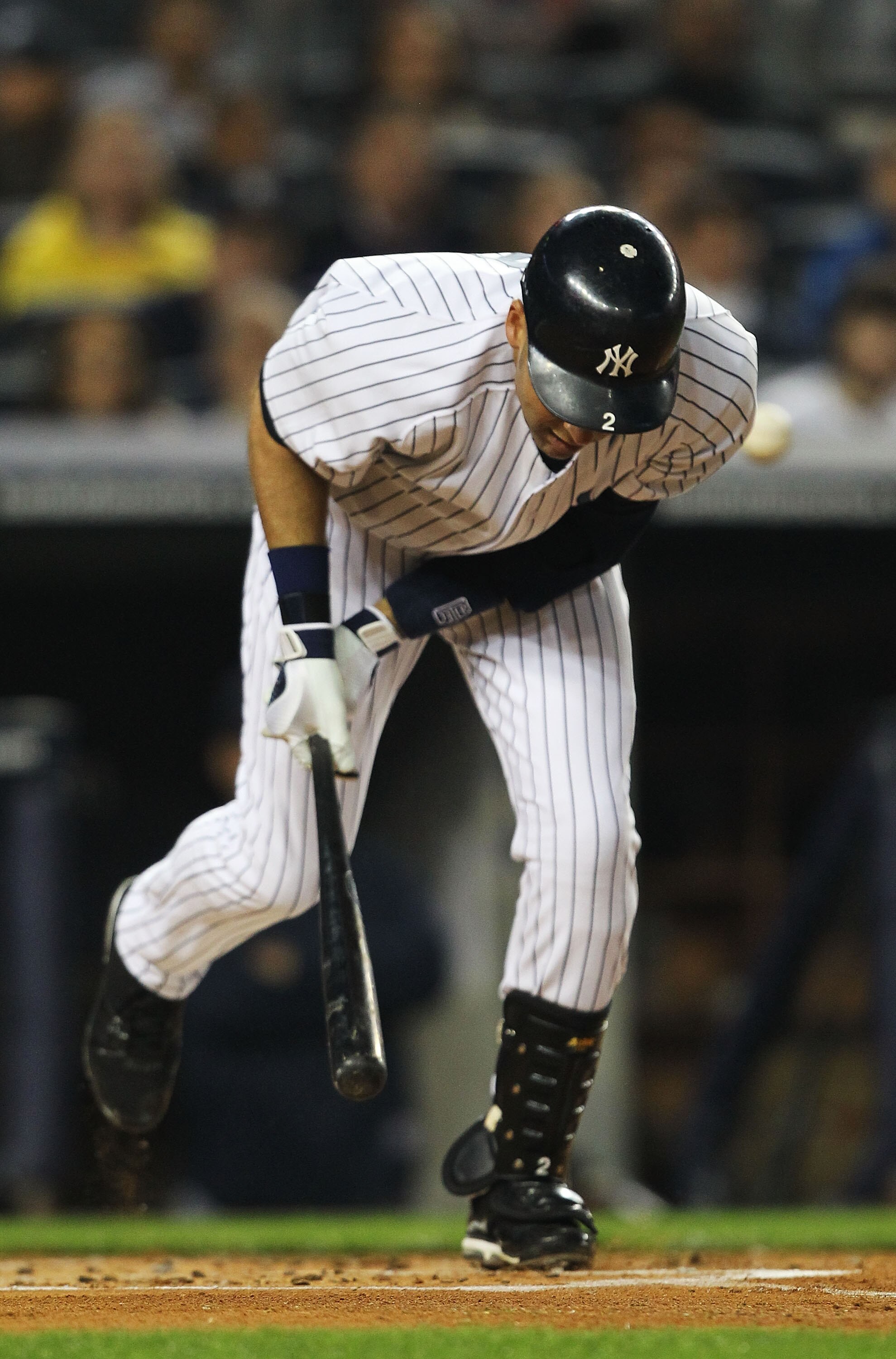 NEW YORK, NY - MAY 15:  Derek Jeter #2 of the New York Yankees is hits a by a pitch during their game against the Boston Red Sox on May 15, 2011 at Yankee Stadium in the Bronx borough of New York City.  (Photo by Al Bello/Getty Images)