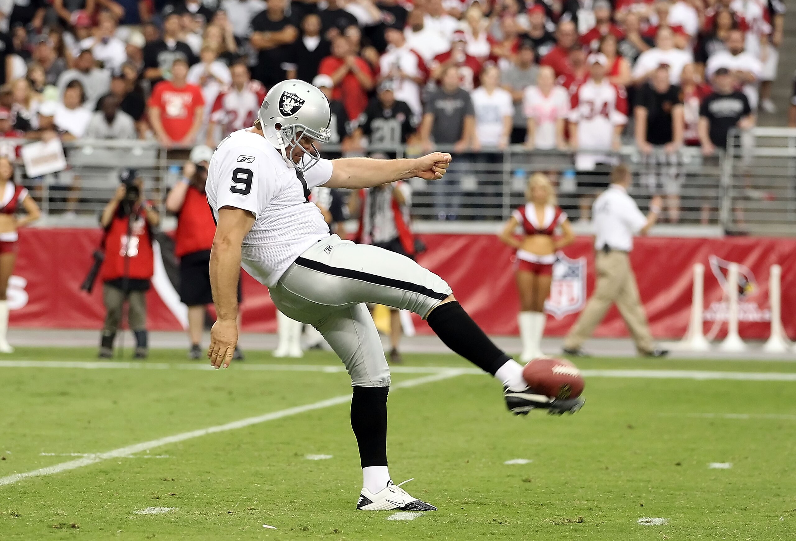 GLENDALE, AZ - SEPTEMBER 26:  Punter Shane Lechler #9 of the Oakland Raiders kicks the ball during the NFL game against the Arizona Cardinals at the University of Phoenix Stadium on September 26, 2010 in Glendale, Arizona.  The Cardinals defeated the Raid