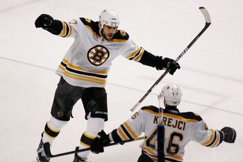 TAMPA, FL - MAY 25:  Milan Lucic #17 celebrates his first period goal with David Krejci #46 of the Boston Bruins in Game Six of the Eastern Conference Finals against the Tampa Bay Lightning during the 2011 NHL Stanley Cup Playoffs at St Pete Times Forum o