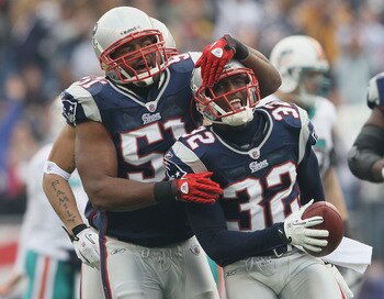 FOXBORO, MA - JANUARY 02: Devin McCourty #32 of the New England Patriots is congratulated by teammate Jerod Mayo #51 after McCourty intercepted a pass by the Miami Dolphins on January 2, 2011 at Gillette Stadium in Foxboro, Massachusetts. (Photo by Elsa/ FOXBORO, MA - JANUARY 02: Devin McCourty #32 of the New England Patriots is congratulated by teammate Jerod Mayo #51 after McCourty intercepted a pass by the Miami Dolphins on January 2, 2011 at Gillette Stadium in Foxboro, Massachusetts. (Photo by Elsa/